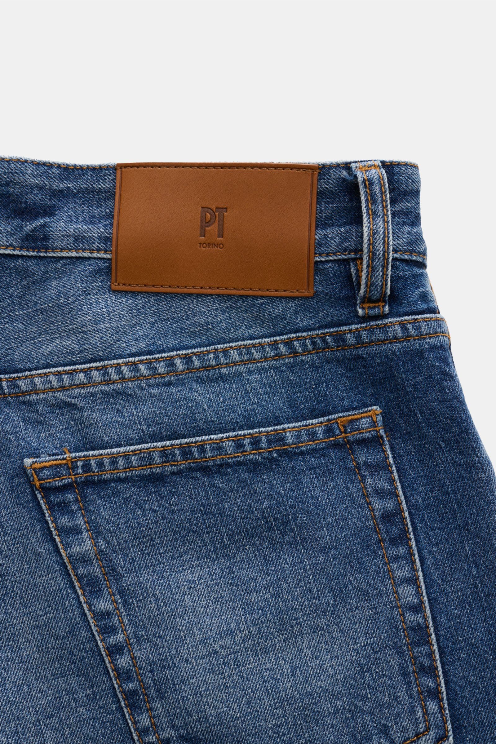Close-up rear view of PT Torino Denim Jeans 'Rebel Fit' smoky blue showing authentic denim, subtle used finish, leather patch, and detailed stitching.