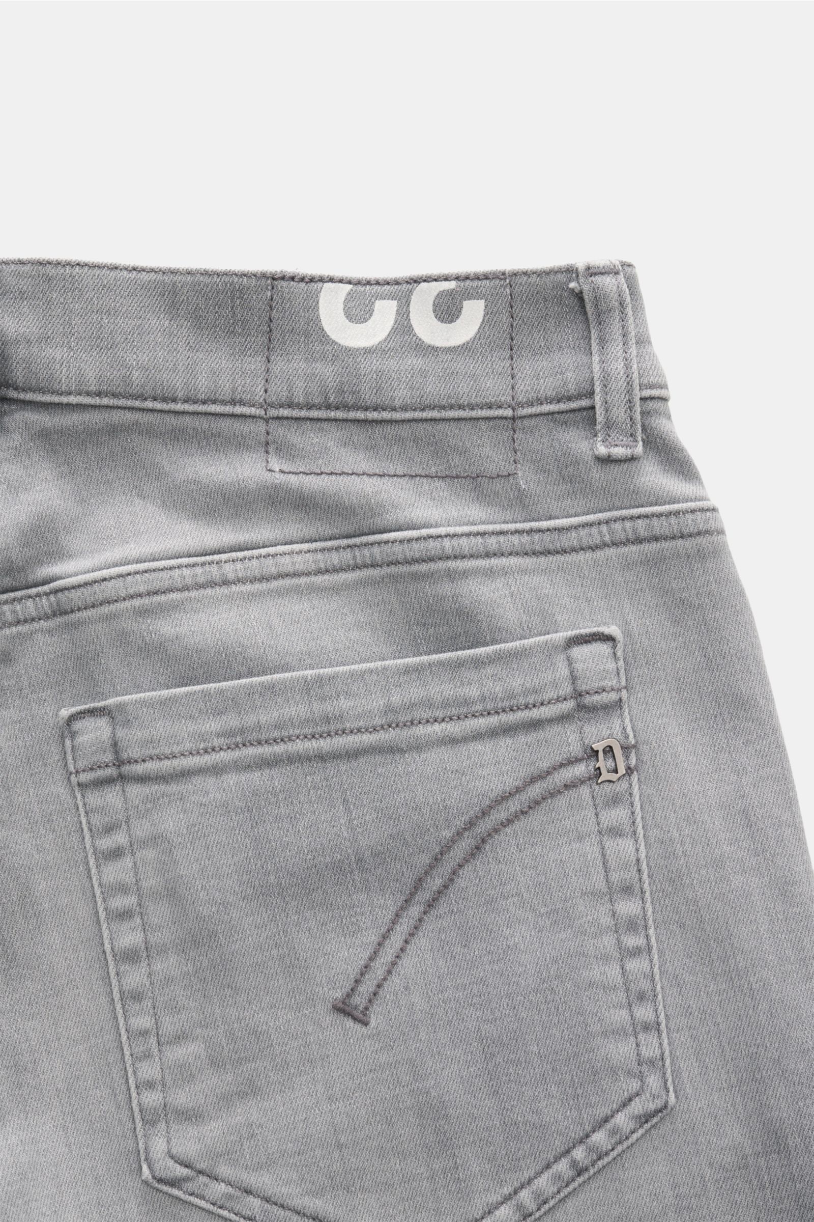 Close-up back view of Dondup Jeans 'George' grey showing soft stretchy cotton denim with authentic used wash, skinny fit, slim calf, low waist, button fly, five-pocket style, jetted coin pocket, back pockets with stitching, signature metal initial, and wo