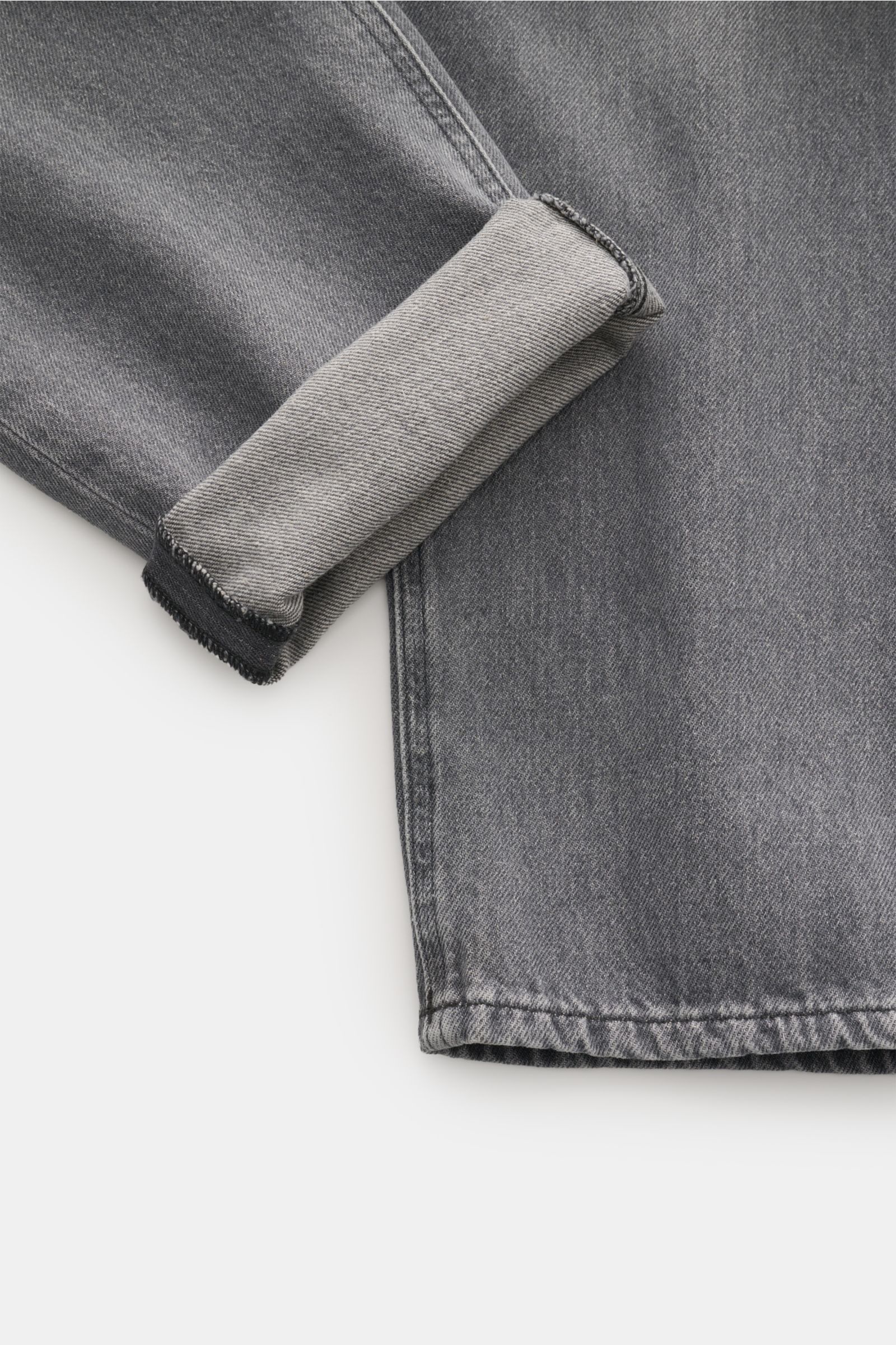 Dondup Jeans 'Paco' grau, Detailaufnahme von unten, zeigt Denim-Bündchen mit Used-Waschung und leichter Distressed-Optik.