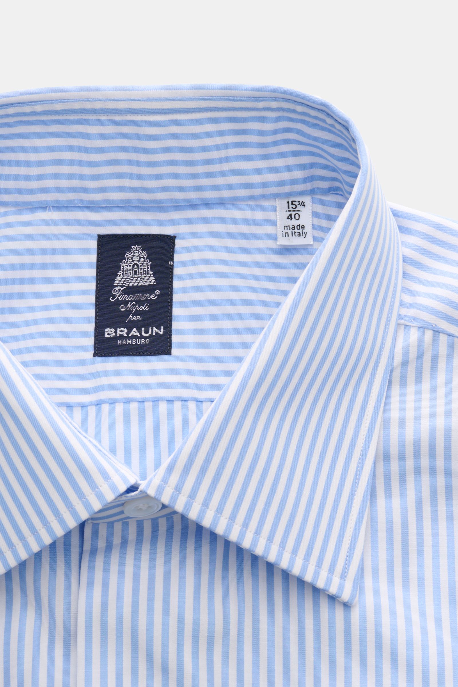 Finamore Business shirt 'Rodi Napoli' Kent collar light blue/white striped, close-up front view showing cotton poplin, smooth feel, slim fit, extra-long sleeves, Kent collar, French button placket, classic barrel cuffs, rounded hem.