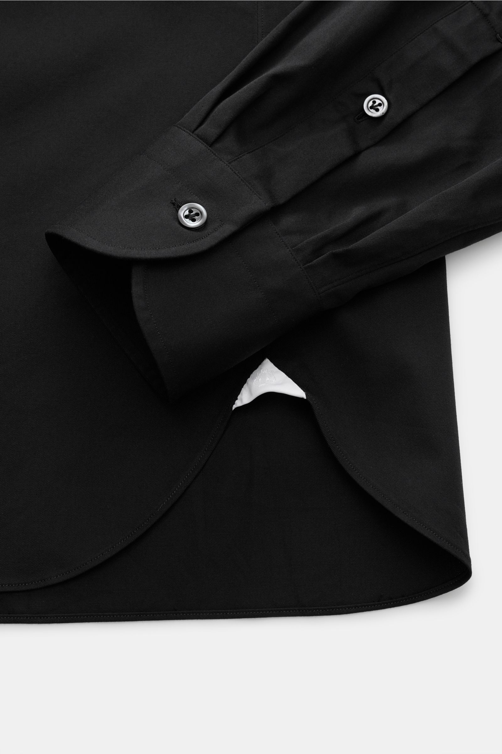 Alt tag (124 characters):
Close-up view of Giampaolo Casual shirt shark collar black showing sleeve cuff and rounded hem in pure cotton popeline fabric.

Description:
Timeless classic: This stylish shirt by GIAMPAOLO works as an office and casual shirt