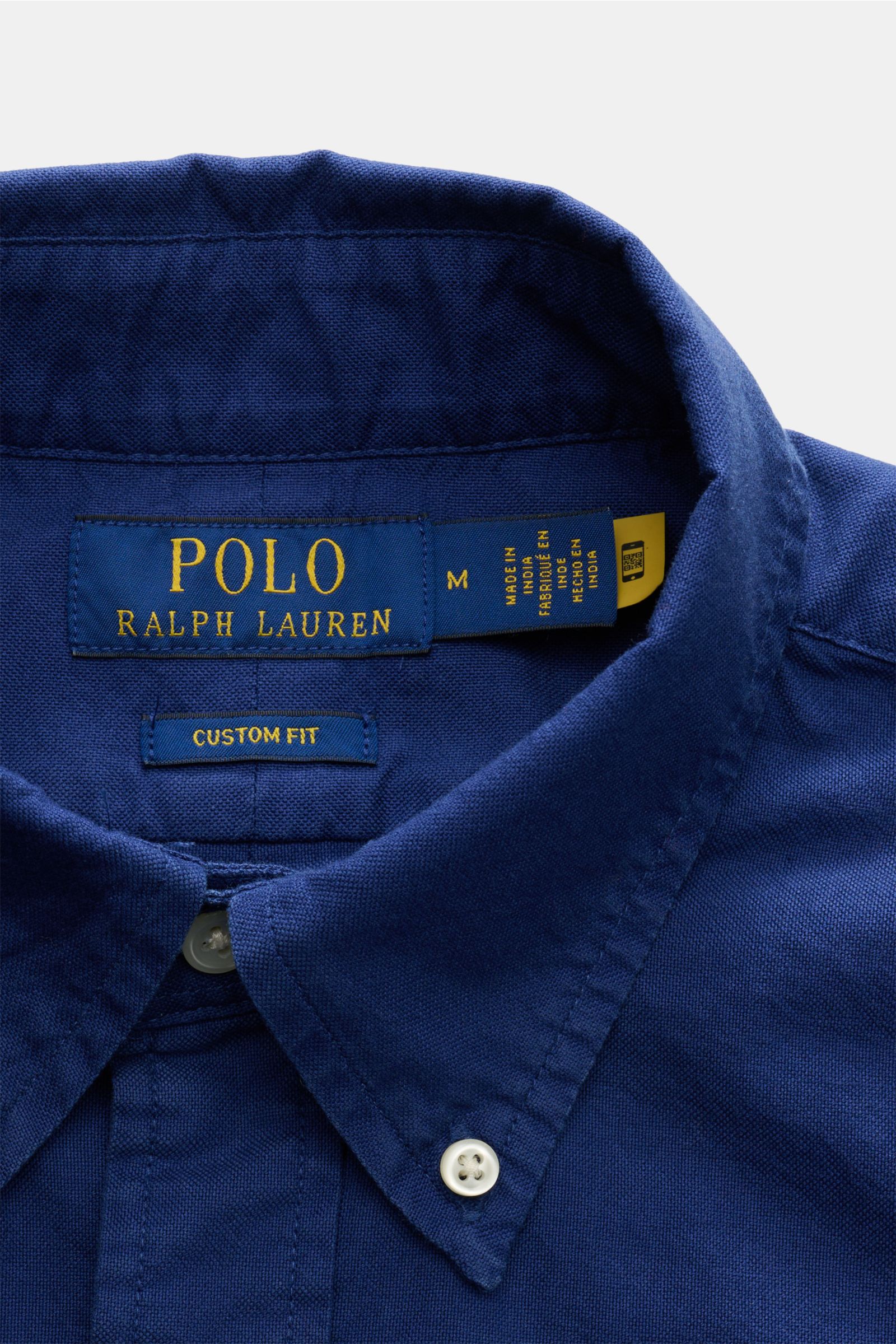 Polo Ralph Lauren Oxford-Hemd Button-Down-Kragen dunkelblau shown from a close-up front view of the collar with button detail. Stilvoller Klassiker mit Liebe zum Detail: Dieses sportliche Hemd von POLO RALPH LAUREN aus reiner Baumwolle mit Button-Down-