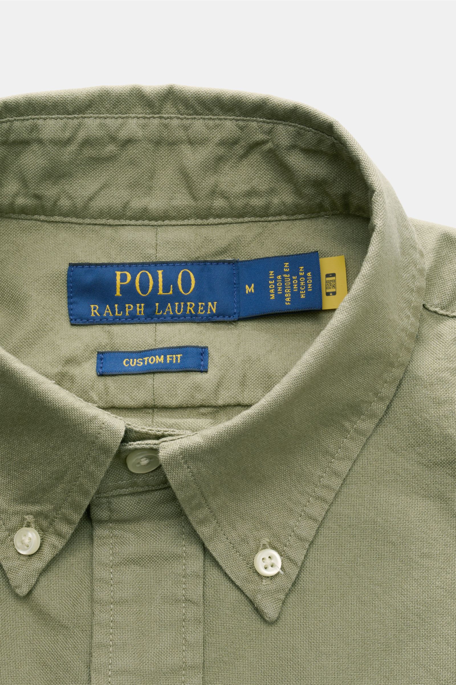 Close-up front view of Polo Ralph Lauren Oxford-Hemd Button-Down-Kragen graugrün showcasing button-down collar and fabric texture.

Description:
Vielseitiger Begleiter für die Herbstsaison: Das POLO RALPH LAUREN Hemd rundet legere Looks mit lässiger El