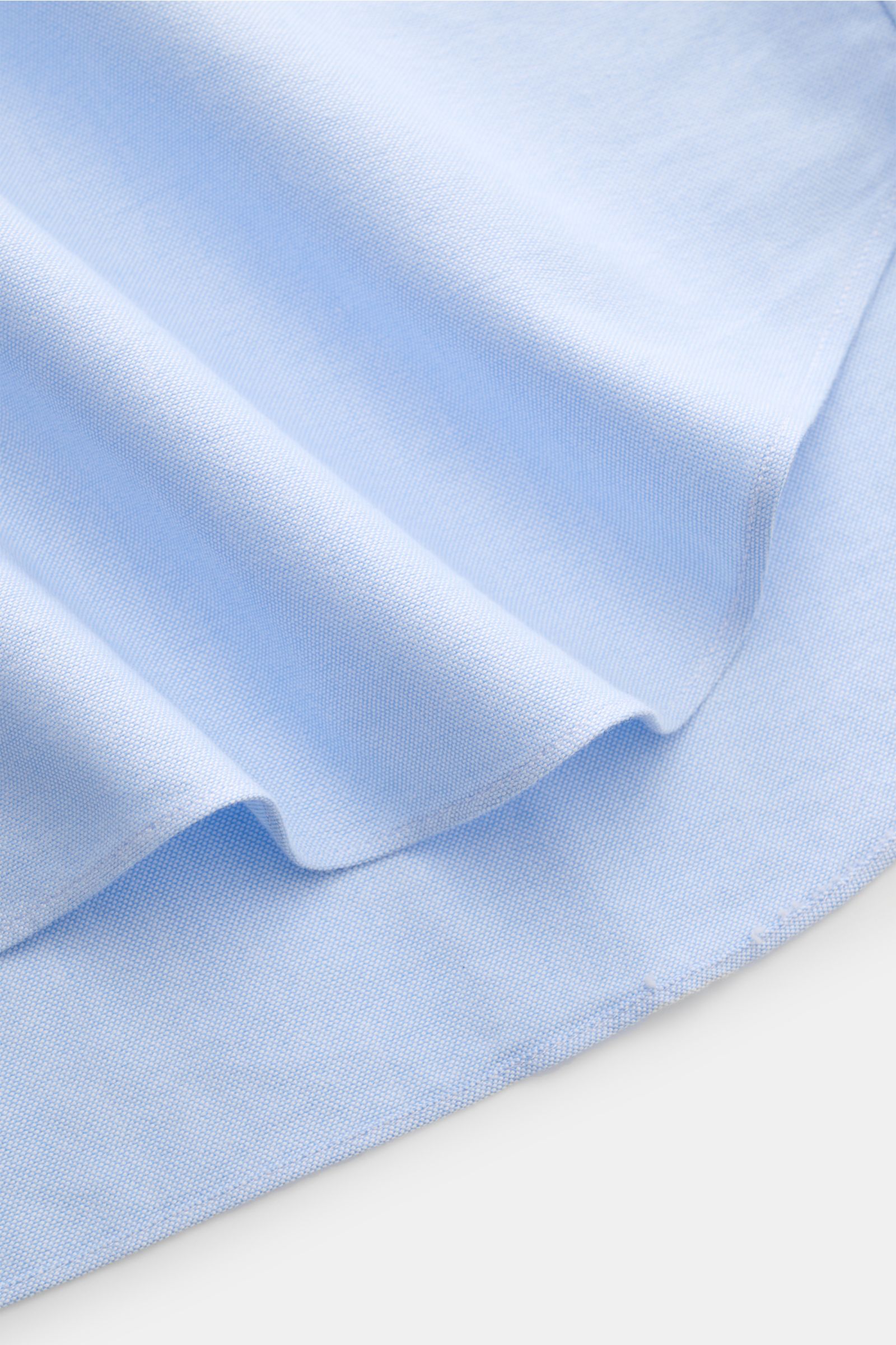 Finamore Oxford Hemd 'Edoardo Gaeta' Haifisch-Kragen hellblau, Nahaufnahme Saumverlauf, Oxford Baumwolle, leicht griffig, Regular Fit, extralange Ärmel, französische Knopfleiste, Sportmanschette.