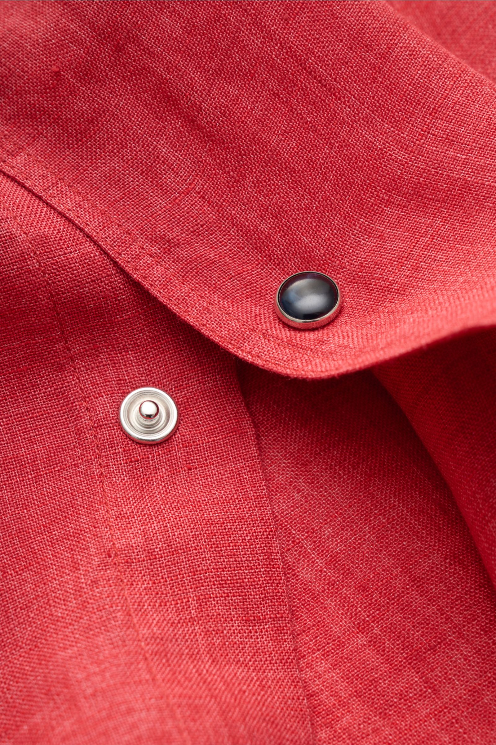 Close-up front view of Ace Denim Linen shirt shark collar red showing textured pure linen fabric with a French button placket and snap buttons, highlighting its lightweight, plain weave, slim fit design.

Description: Stay comfortable in the warmer mon
