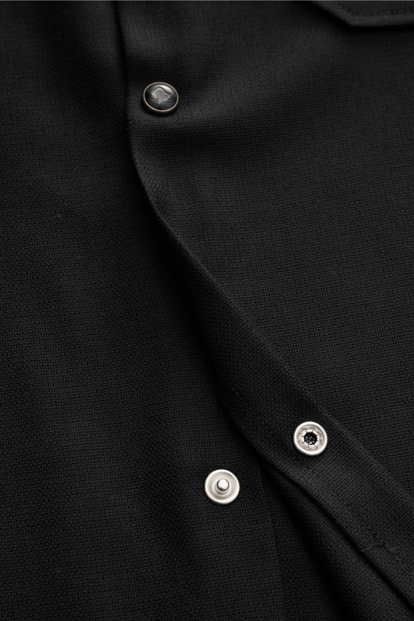 Close-up front view of the black Marco Pescarolo Casual shirt 'Next' Kent collar black, showcasing pure virgin wool fabric and button details.  
Exclusive casual look with maximum comfort: This elegant MARCO PESCAROLO shirt in pure virgin wool features