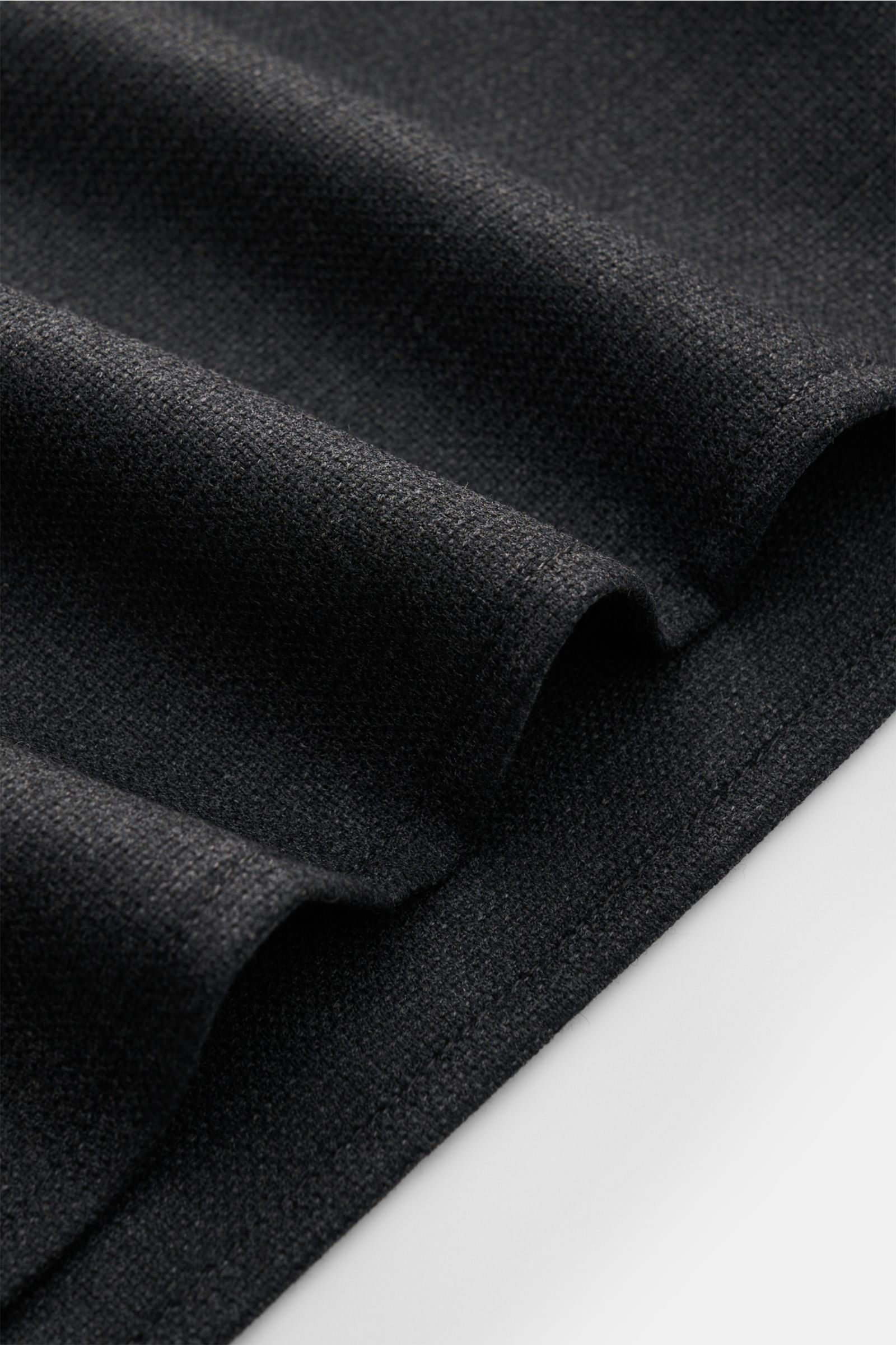 Close-up from above of the anthracite mottled fabric of the Marco Pescarolo Casual shirt 'Next' Kent collar anthracite mottled, showing its texture and stitching. Exclusive casual look with maximum comfort: This elegant MARCO PESCAROLO shirt in pure virgi