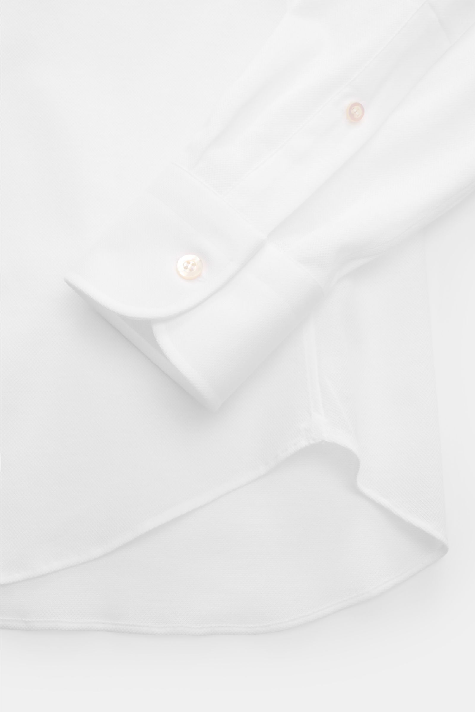 Fray Piqué-Hemd Haifisch-Kragen 'Lione Cucitura' weiß, Detailaufnahme Saum und Sportmanschette, Slim Fit aus reiner Baumwolle.
