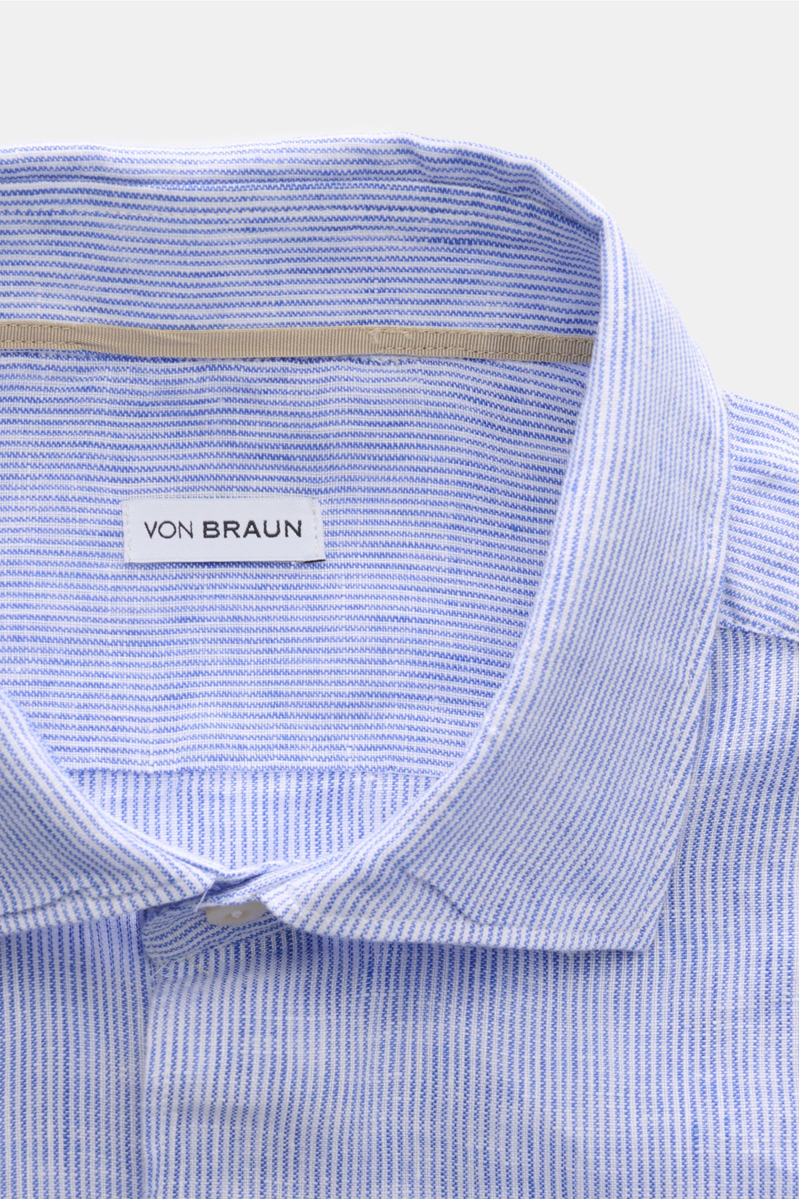 von Braun Linen shirt shark collar blue/white striped shown from above, highlighting pure linen fabric, fine stripes, shark collar, and label. Effortlessly lightweight: This VON BRAUN shirt in pure linen has an airy feel and a relaxed look – a stylish com