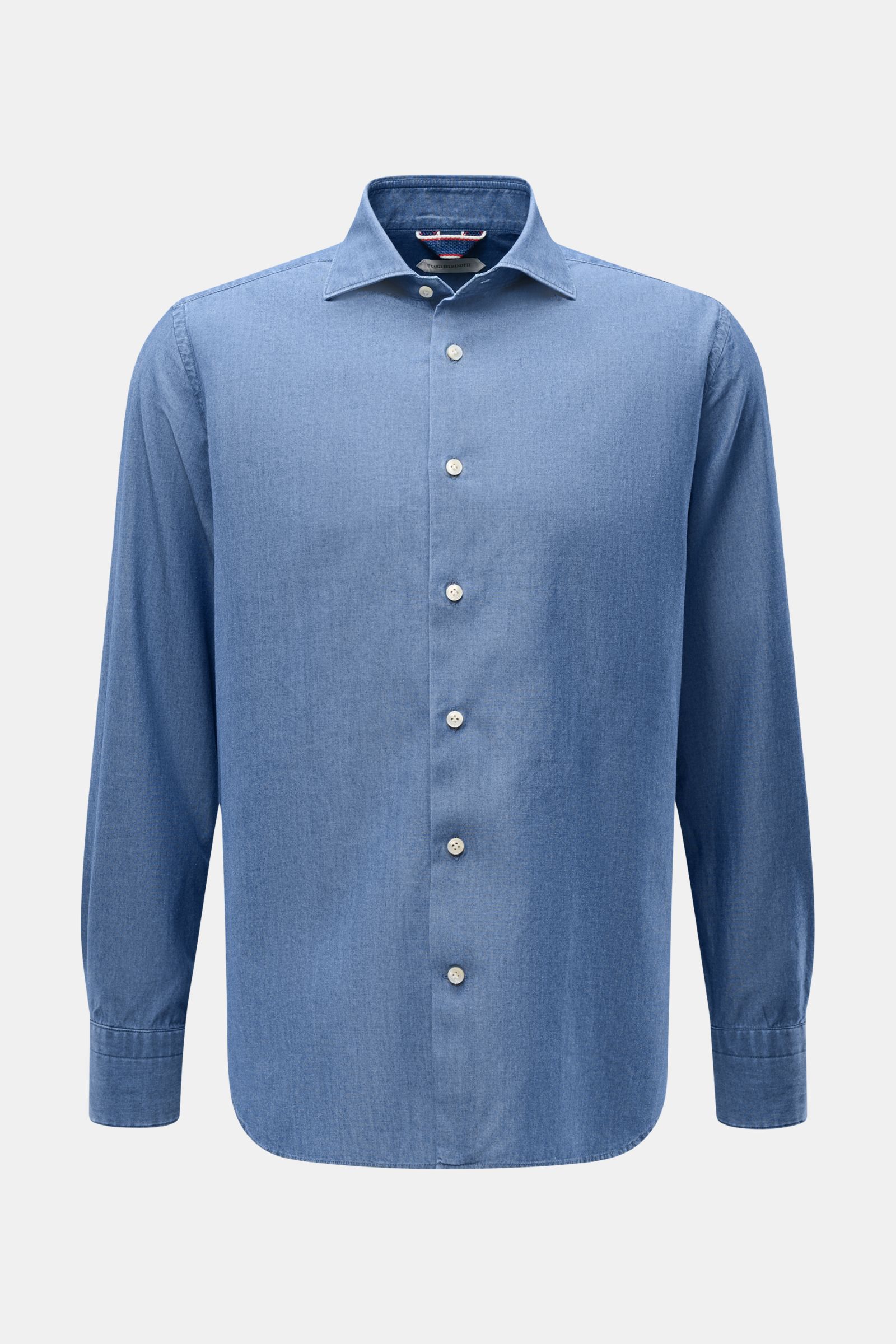 Front view of Guglielminotti Chambray shirt shark collar smoky blue in pure cotton with smooth feel, oversized fit, French button placket, classic barrel cuffs, and slightly rounded hem.