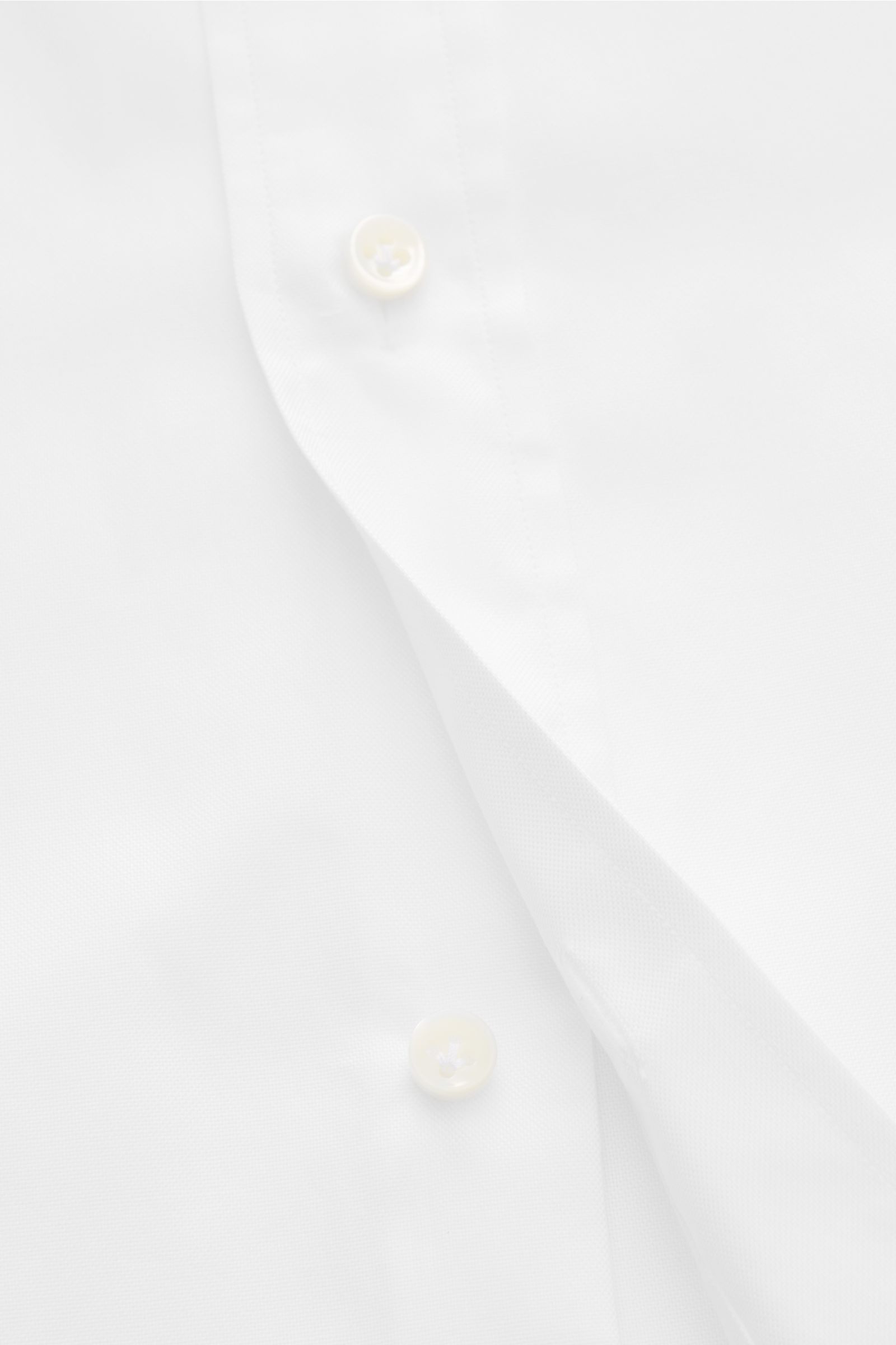 Alt tag (125 characters max): Close-up front view of Giampaolo Oxford shirt button-down collar white showing fabric texture and buttons.

Description:  
A classic from Italian shirt experts GIAMPAOLO: This shirt in fine Oxford fabric with a button-down