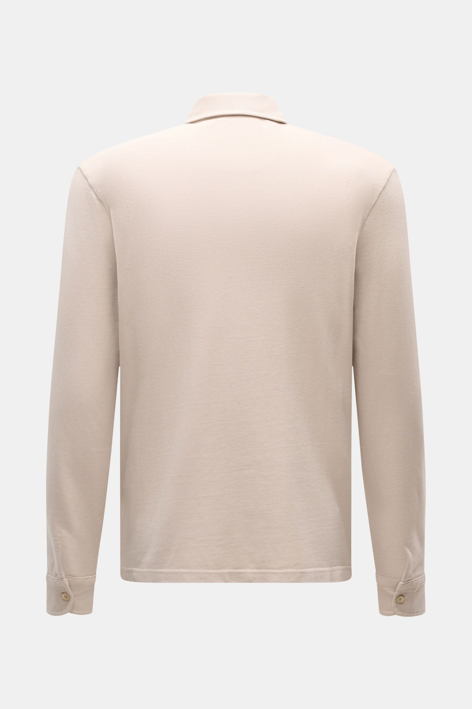 Back view of the 04651/ A trip in a bag Piqué shirt slim collar beige, showing its pure cotton fabric and fine piqué texture, with long sleeves and classic barrel cuffs.

Casual everyday basic by 04651/ A TRIP IN A BAG: This casual shirt in pure cotton
