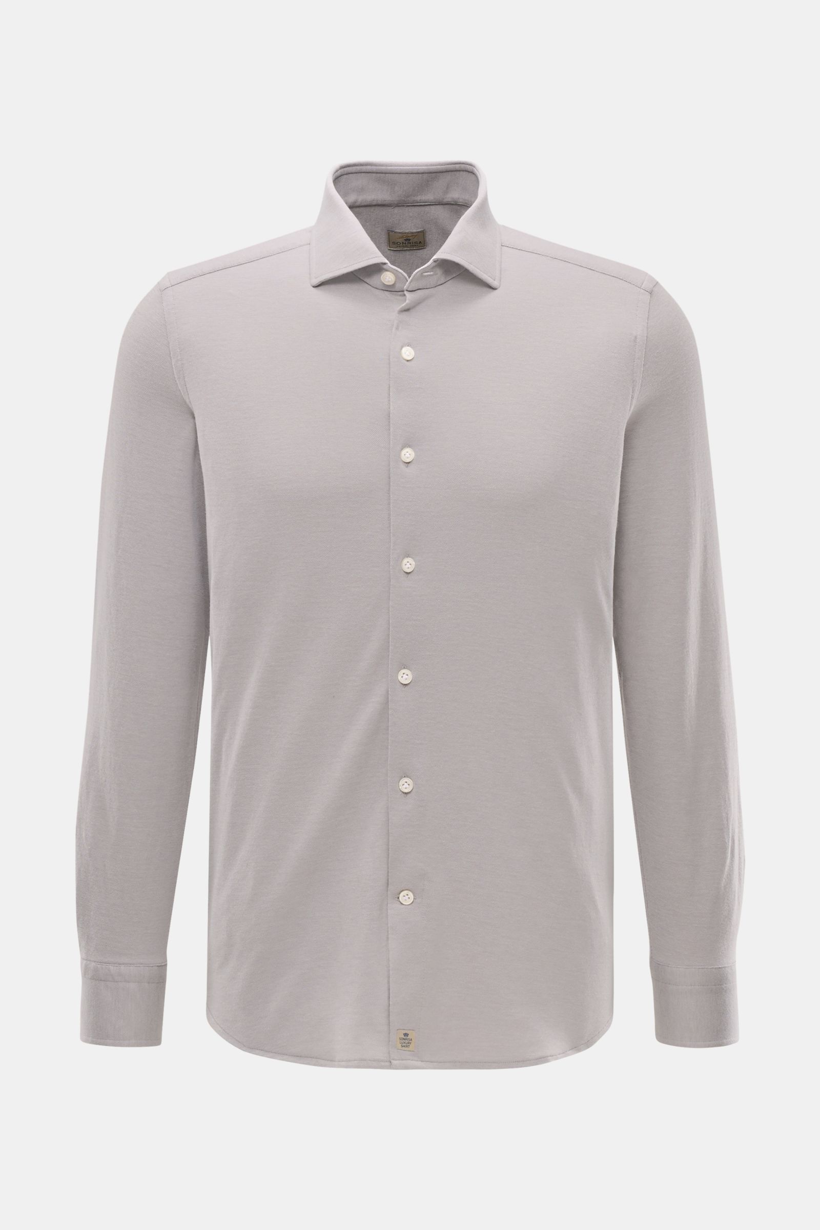 Front view of Sonrisa Jersey shirt shark collar grey in soft cotton-lyocell blend, slim fit with French button placket and barrel cuffs.

Comfort meets style: This jersey model in a soft cotton-lyocell blend by SONRISA adds a touch of elegance to any s