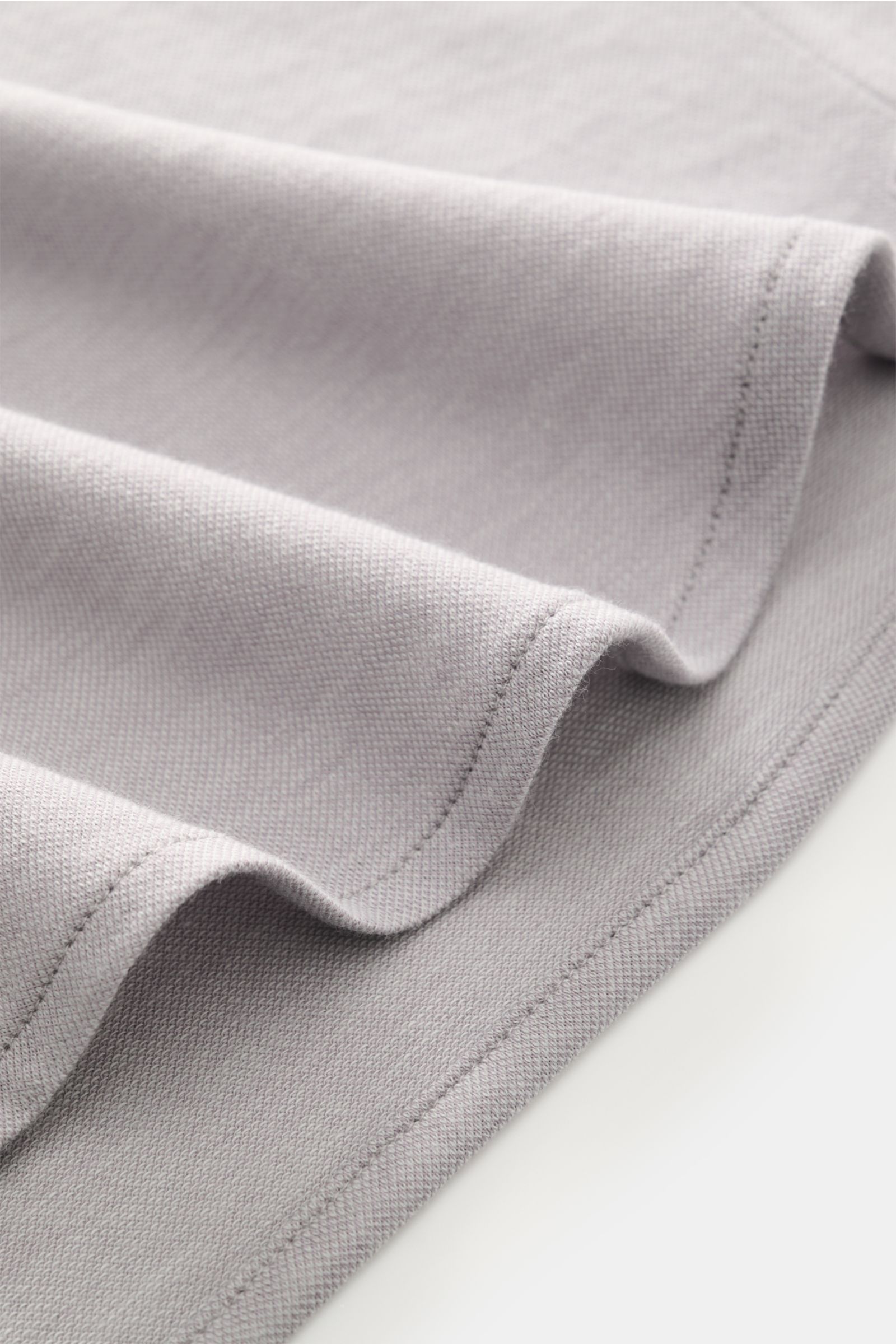 Close-up front view of Sonrisa Jersey shirt shark collar grey, showing soft cotton-lyocell fabric texture and stitching detail.

Comfort meets style: This jersey model in a soft cotton-lyocell blend by SONRISA adds a touch of elegance to any smart-casu
