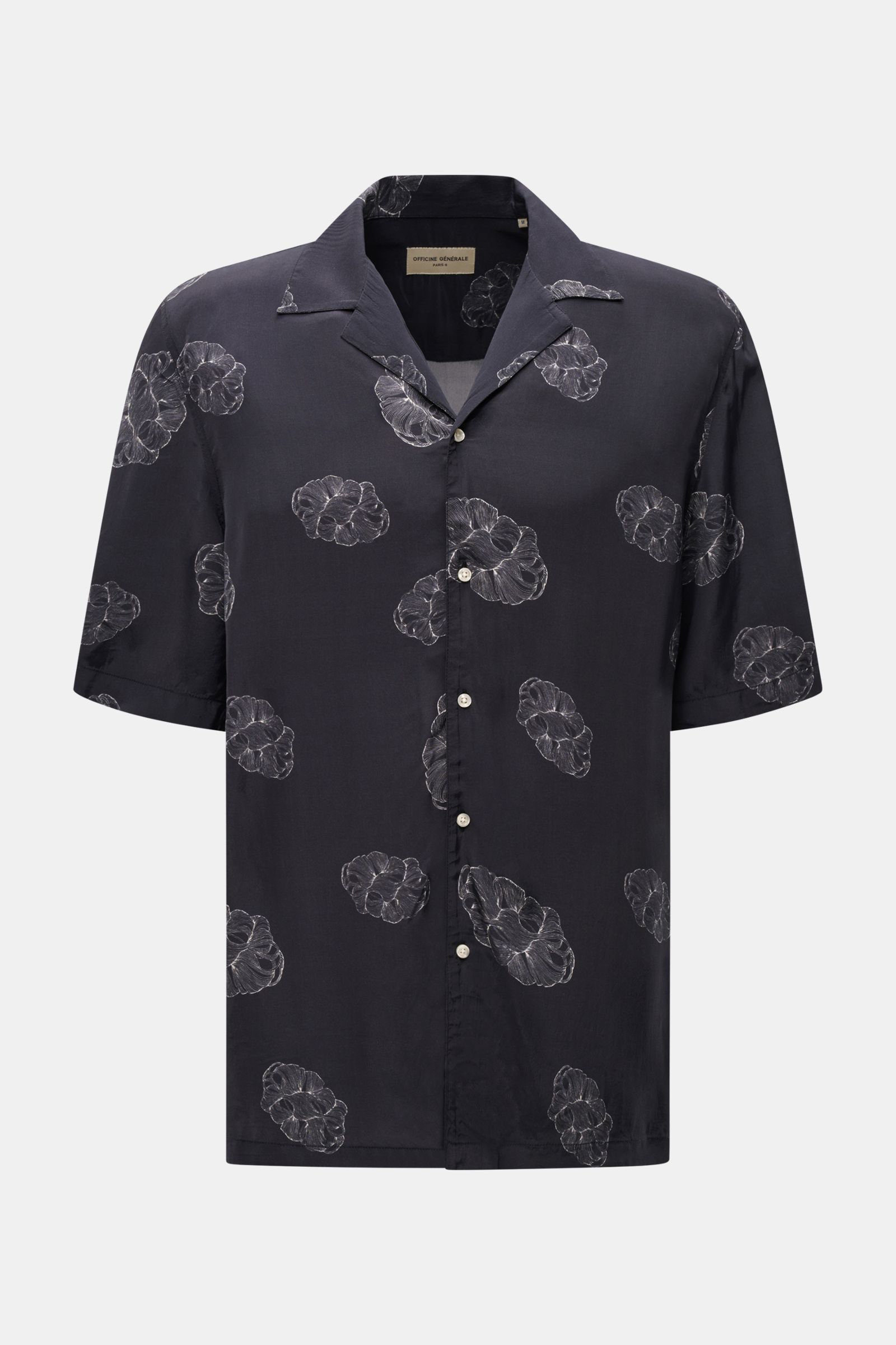 Front view of Officine Générale short-sleeved shirt 'Eren' Cuban collar black patterned with pure viscose, soft light feel, regular fit, French button placket, straight hem, side vents, longer back for hot summer days.
