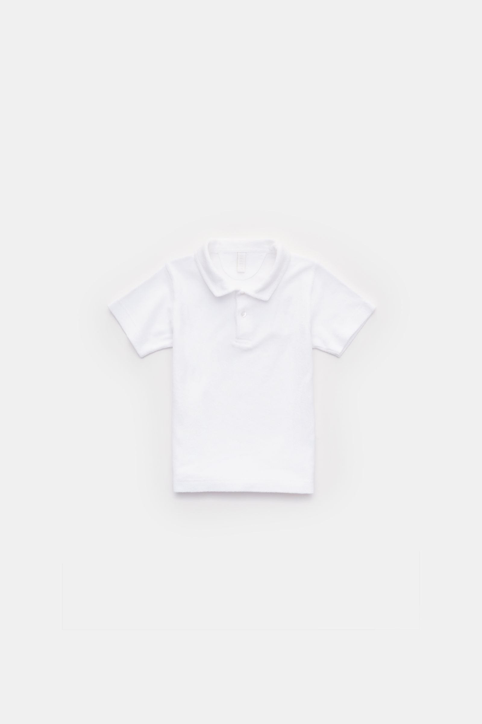 04651/ A trip in a bag Kinder Frottee-Poloshirt 'Kids Terry Polo' weiß