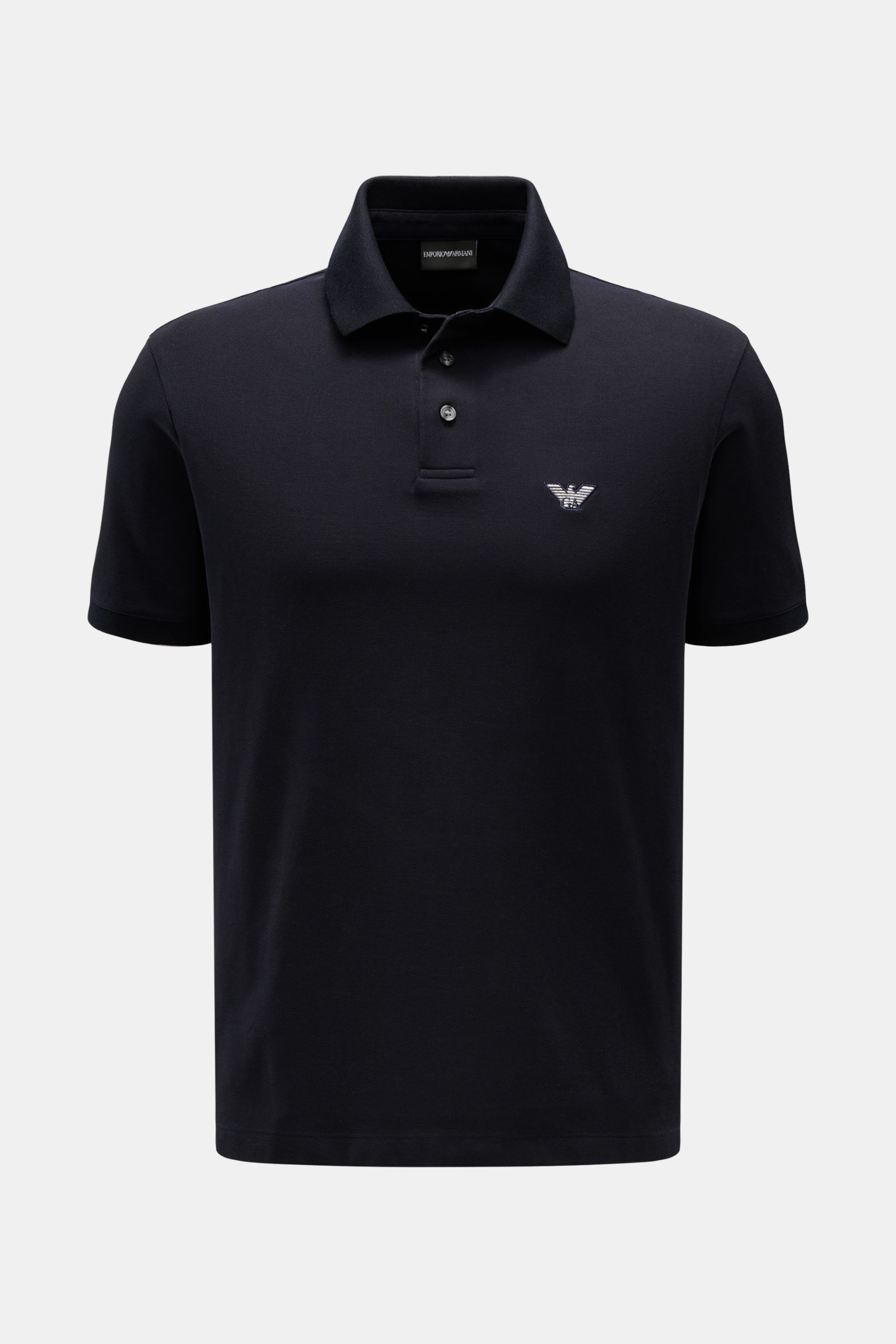 Emporio Armani Polo shirt navy shown from the front, a timeless, casual piqué jersey made of pure cotton with regular fit, classic collar, label stitching on the chest, and hem with side vents. A versatile classic for sporty looks: This polo shirt by EMPO