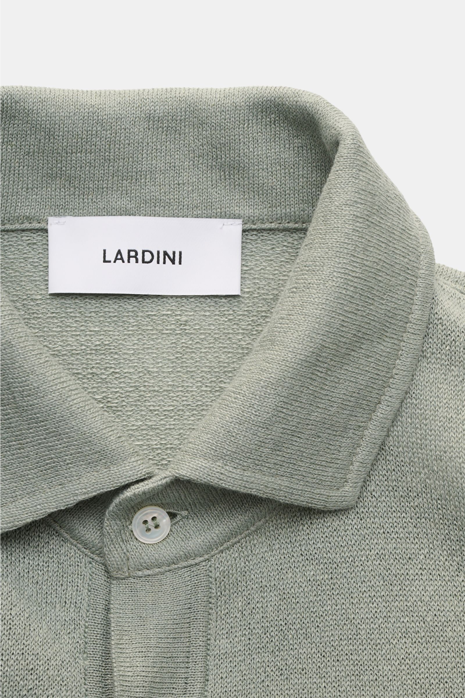 Lardini Short sleeve knit polo sage shown from a close-up top-front perspective, featuring a linen and cotton blend, slightly robust, fine airy knit, slim fit, signature polo collar, three-button placket, and flexible ribbed bands. Elegance for warmer sea