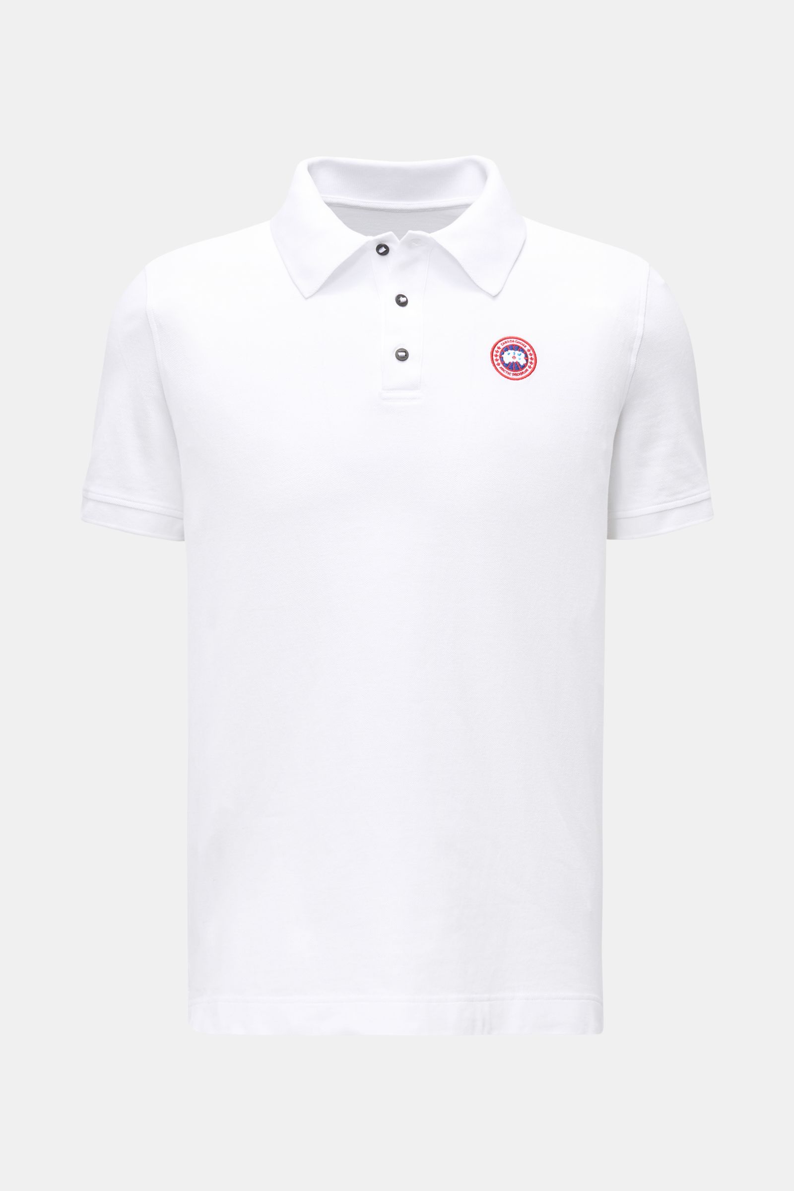 Front view of Canada Goose Poloshirt 'Beckley' weiß, a white short-sleeve polo made from pure cotton piqué with a three-button placket and Canada Goose patch.

Das klassische Poloshirt 'Beckley' ist ein Must-have in der sportiven Herrengarderobe: Aus B