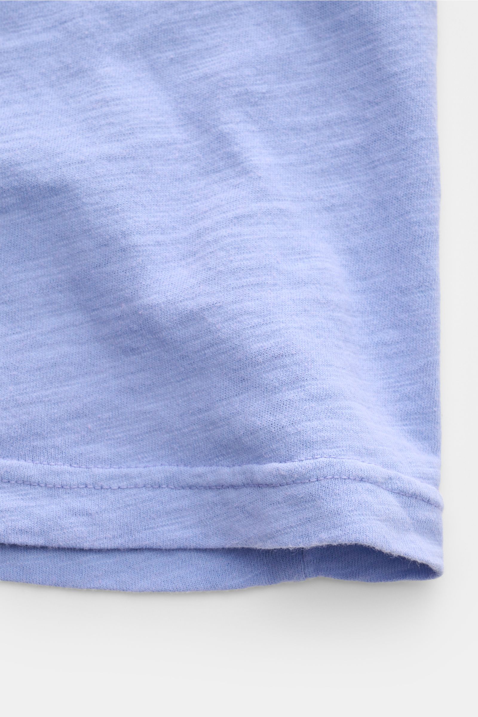 B.F. Knitwear Jersey polo shirt blue mottled shown close-up from the side, featuring pure cotton, soft feel, slim fit, classic polo collar. Uncomplicated classic: This jersey polo shirt by B.F. KNITWEAR is a versatile basic for the warmer months. Pure cot