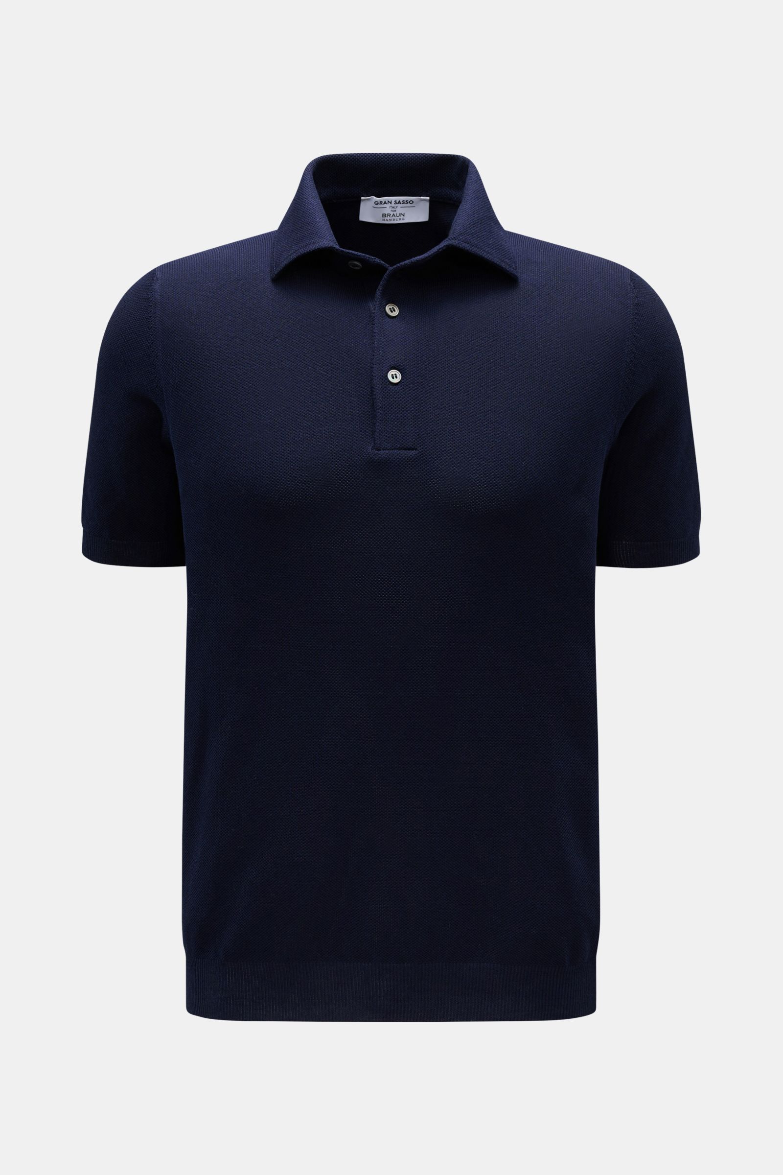 Front view of Gran Sasso Polo shirt navy in pure piqué cotton with slim fit, dress-shirt collar, three-button placket, and elasticated ribbed bands.

Summer sophistication in its purest form: This short sleeve polo shirt in pure cotton piqué by GRAN SA