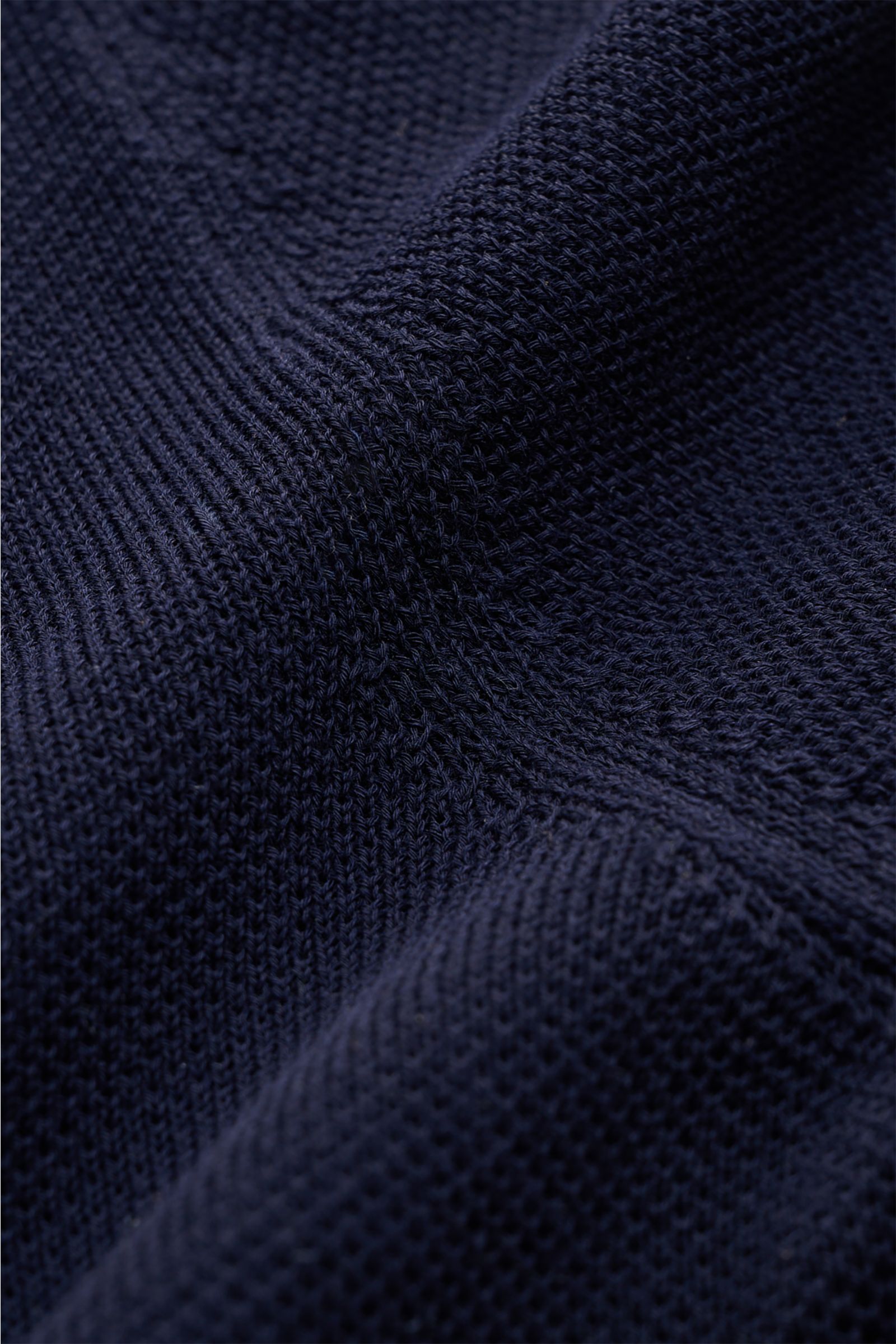Close-up front view of Gran Sasso Polo shirt navy showing textured pure piqué cotton fabric with breathable, robust material and elasticated ribbed bands. Summer sophistication in its purest form: This short sleeve polo shirt in pure cotton piqué by GRAN 