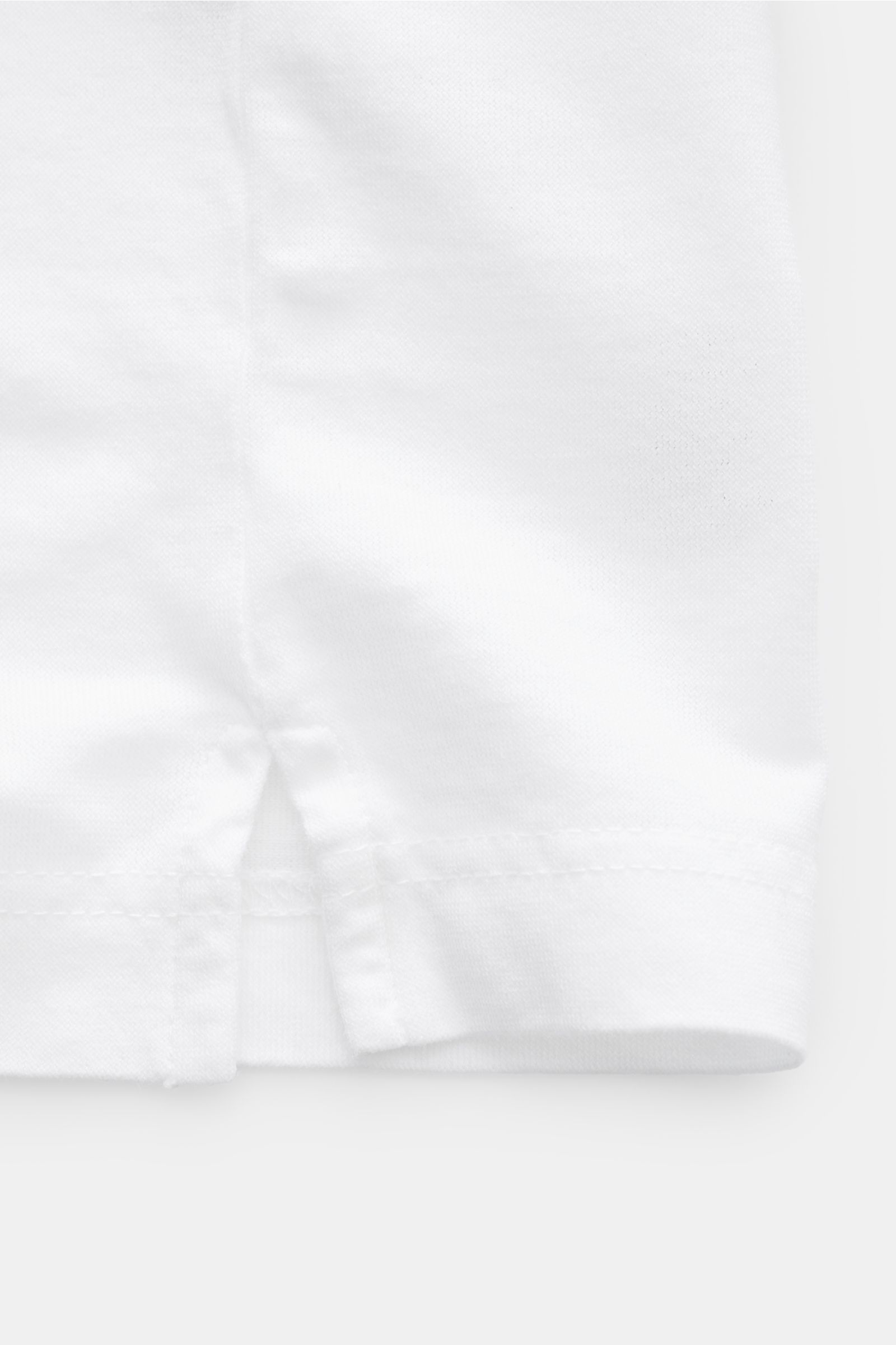 BRAUN Hamburg Jersey-polo shirt white shown from front, sporty cotton jersey with slim fit, shark collar, open placket, side vents.