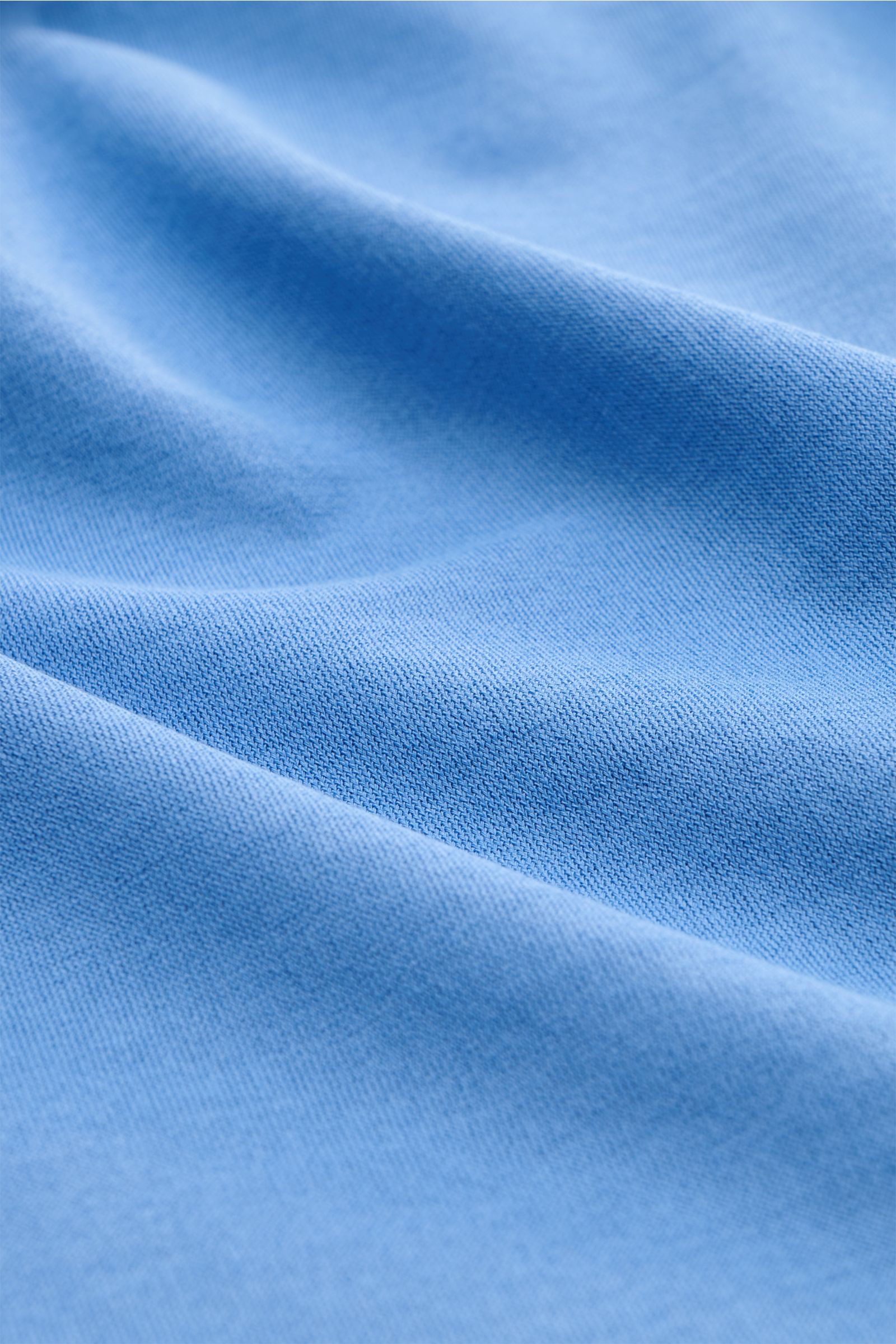 Close-up front view of the BRAUN Hamburg Jersey polo shirt blue showing fine cotton jersey fabric texture with casual sporty style.

Description: Sporty style for the new season: BRAUN HAMBURG has processed pure cotton into fine jersey to make this pol