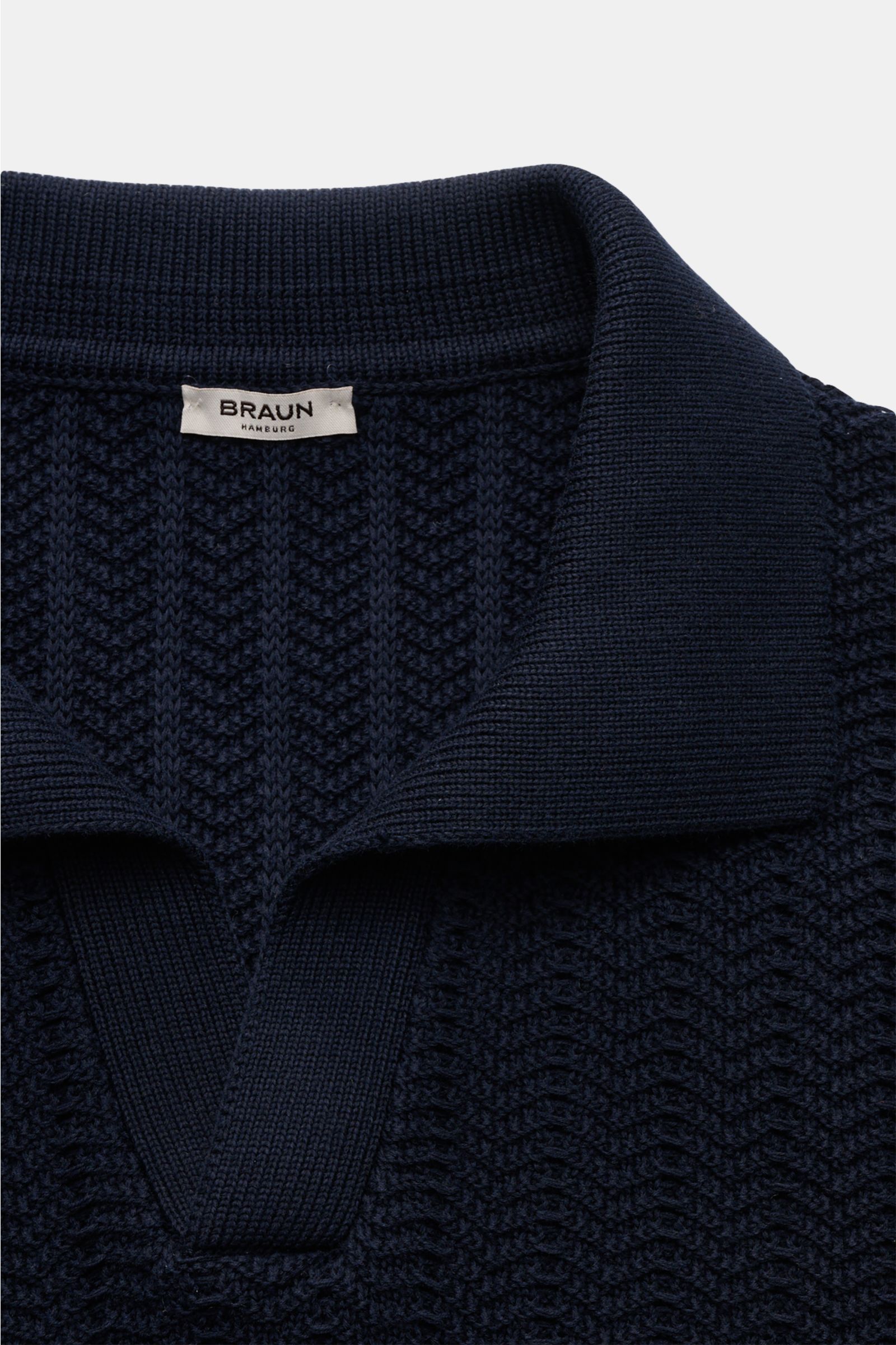 Close-up front view of the Gran Sasso Short sleeve knit polo shirt navy, showcasing its classic polo collar, open collar strip, and textured robust pure cotton knit fabric with wide ribbed bands. Classic polo silhouette meets a distinctive fabric thicknes