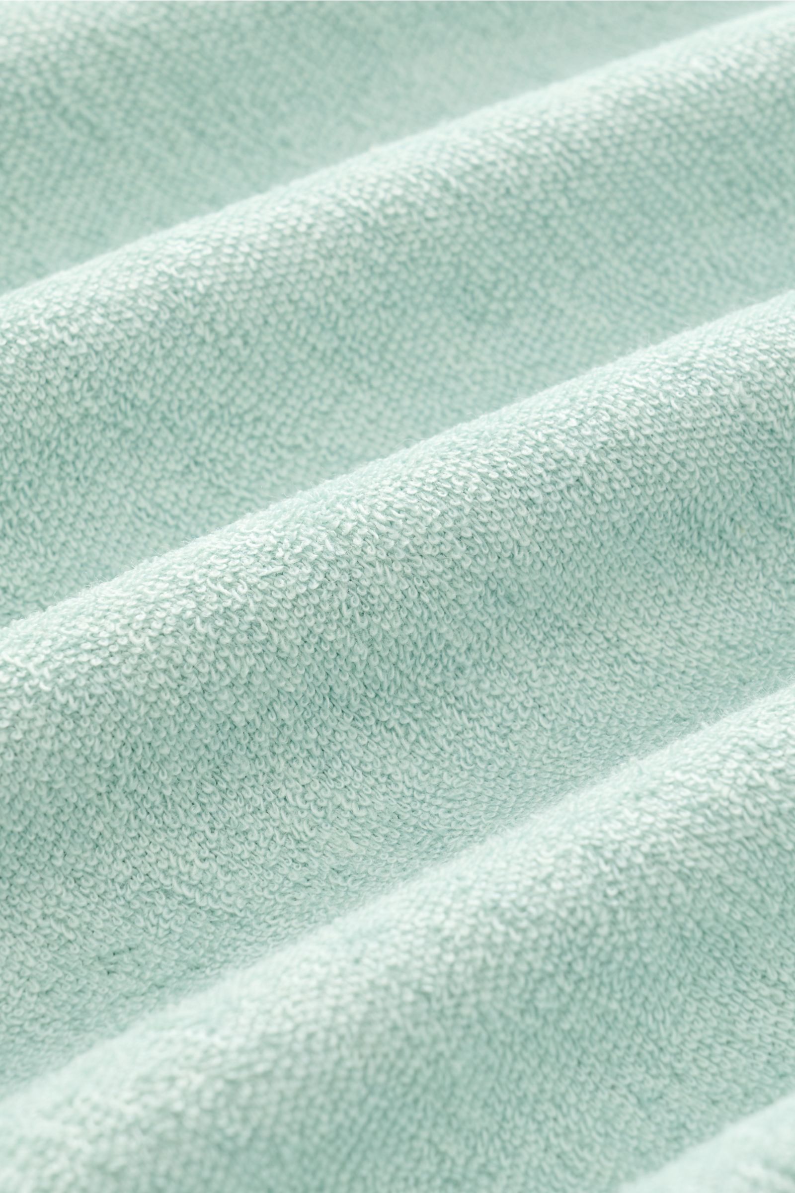 MC2 Saint Barth Frottee-Poloshirt 'Jeremy' mintgrün Nahaufnahme der weichen Lyocell-Baumwollstruktur, Frottee, Slim Fit, Polo-Kragen, Saumschlitze, Logo-Stitching.