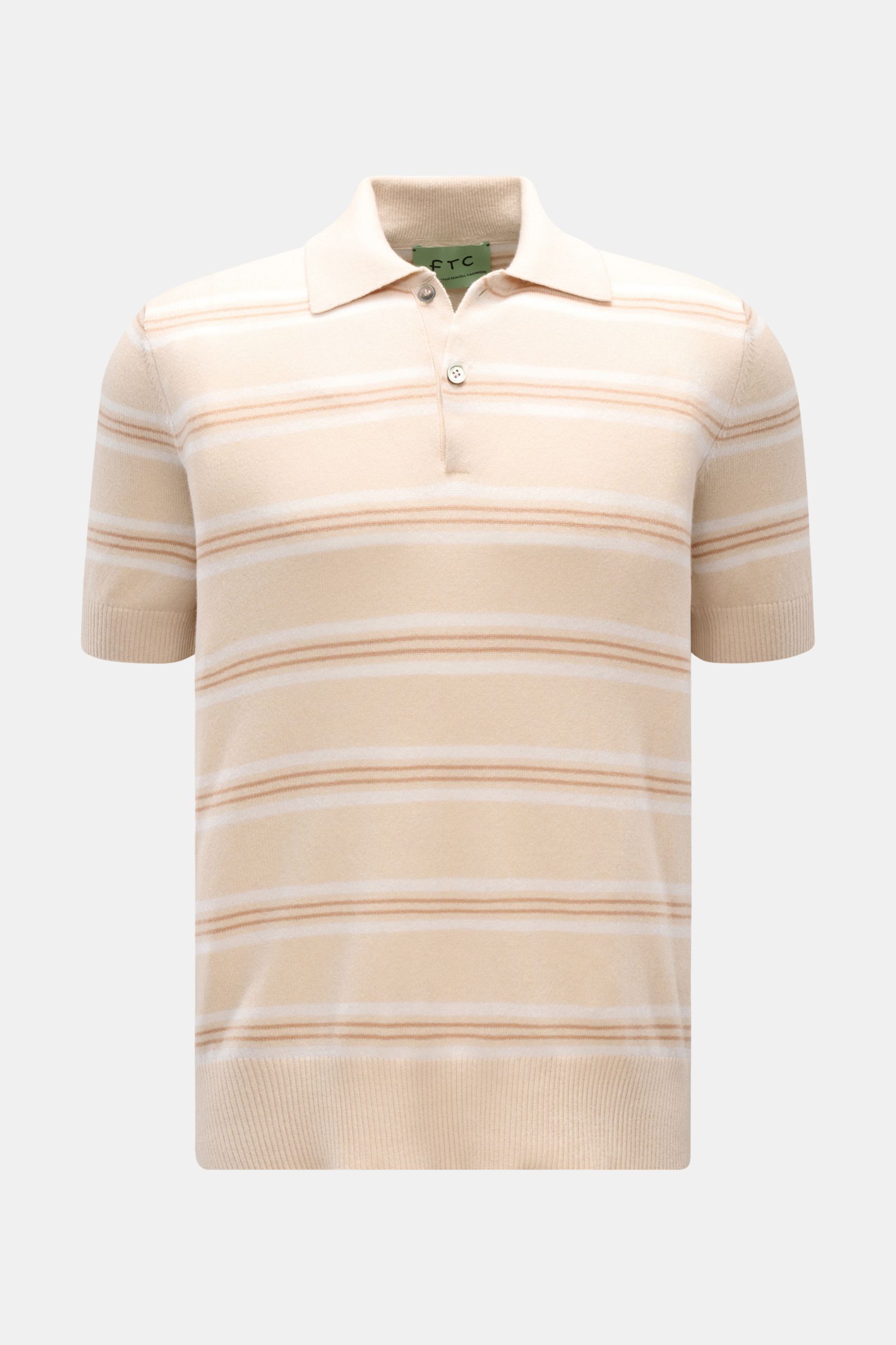 Front view of FTC FTC short sleeve knit polo beige/cream/light brown striped with a two-button placket and ribbed bands.

FTC presents this short sleeve knit polo in a fine blend of cotton, SeaCell and cashmere with an all-over striped pattern – perfec