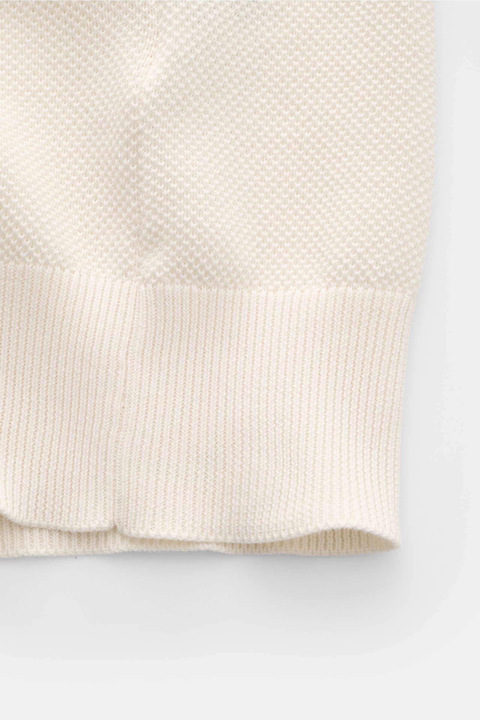 Close-up bottom hem view of Filippo de Laurentiis Short sleeve knit polo cream, showing fine textured pure cotton knit with ribbed bands.

Subtle luxury from FILIPPO DE LAURENTIIS – this knit polo in pure cotton in a fine textured knit with contrasting