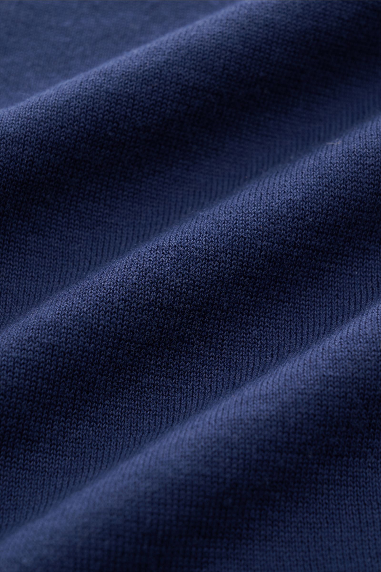 Close-up front view of Drumohr Short sleeve knit shirt dark blue fabric showing fine knit texture and smooth folds, stylish casual look: This knit shirt by DRUMOHR is a versatile piece for your spring wardrobe. Pure cotton, very soft feel, regular fit, Cu
