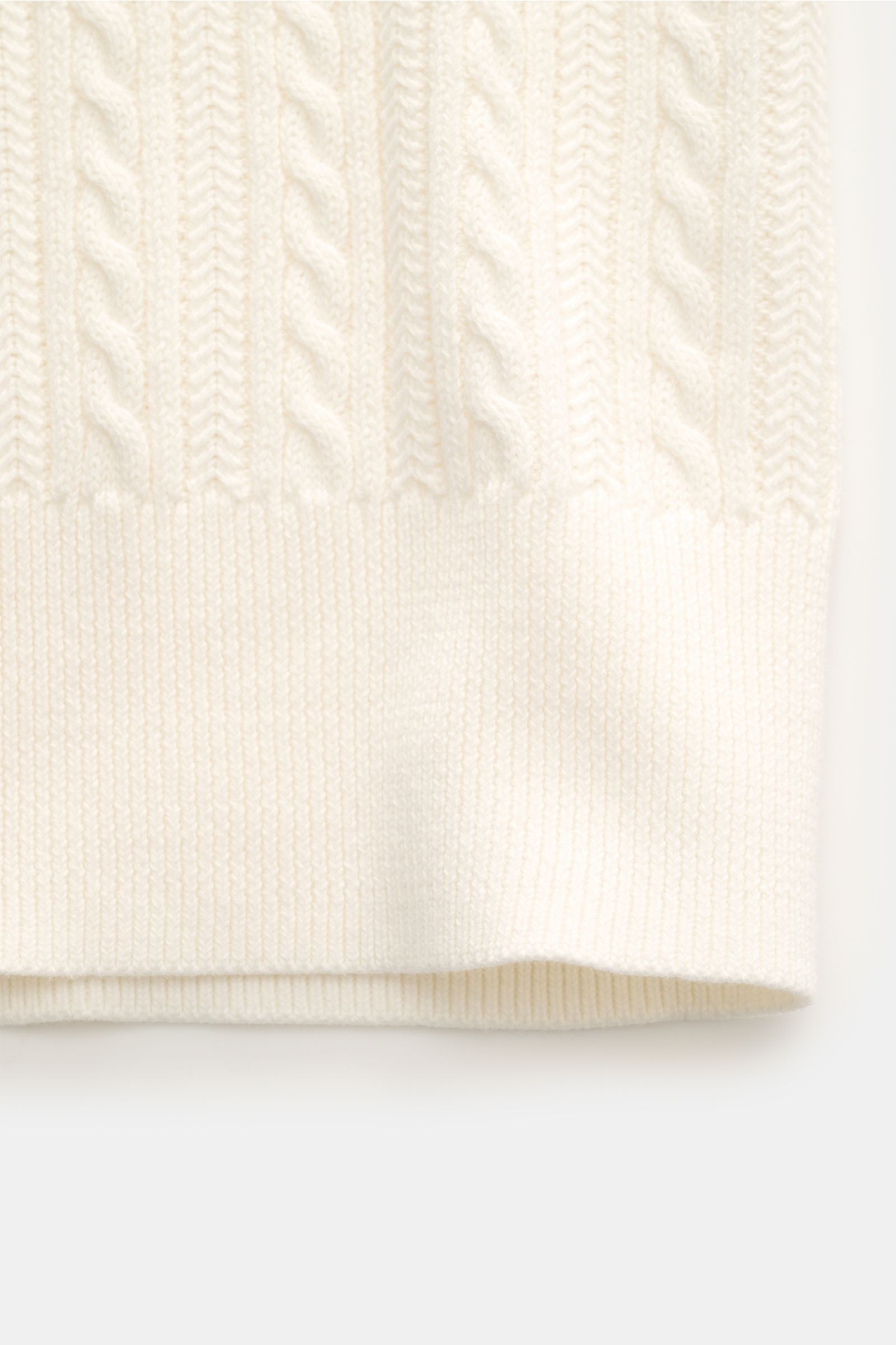 Close-up front view of Polo Ralph Lauren Short sleeve knit polo shirt off-white showing fine cable knit pattern and ribbed hem.

Versatile classic: This short-sleeved knit polo by POLO RALPH LAUREN delivers maximum comfort and catches the eye on hot da