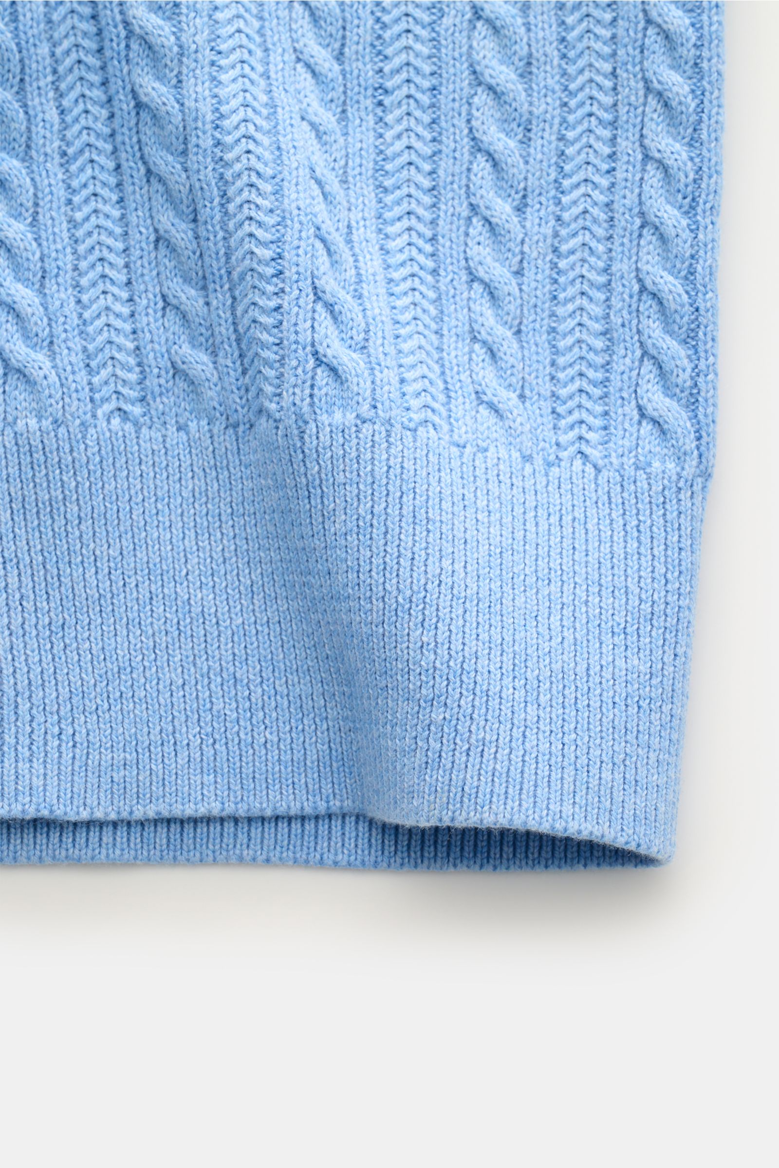 Close-up front view of Polo Ralph Lauren Short sleeve knit polo light blue showing fine cable knit pattern and elastic waistband.

Versatile classic: This short-sleeved knit polo by POLO RALPH LAUREN delivers maximum comfort and catches the eye on hot 