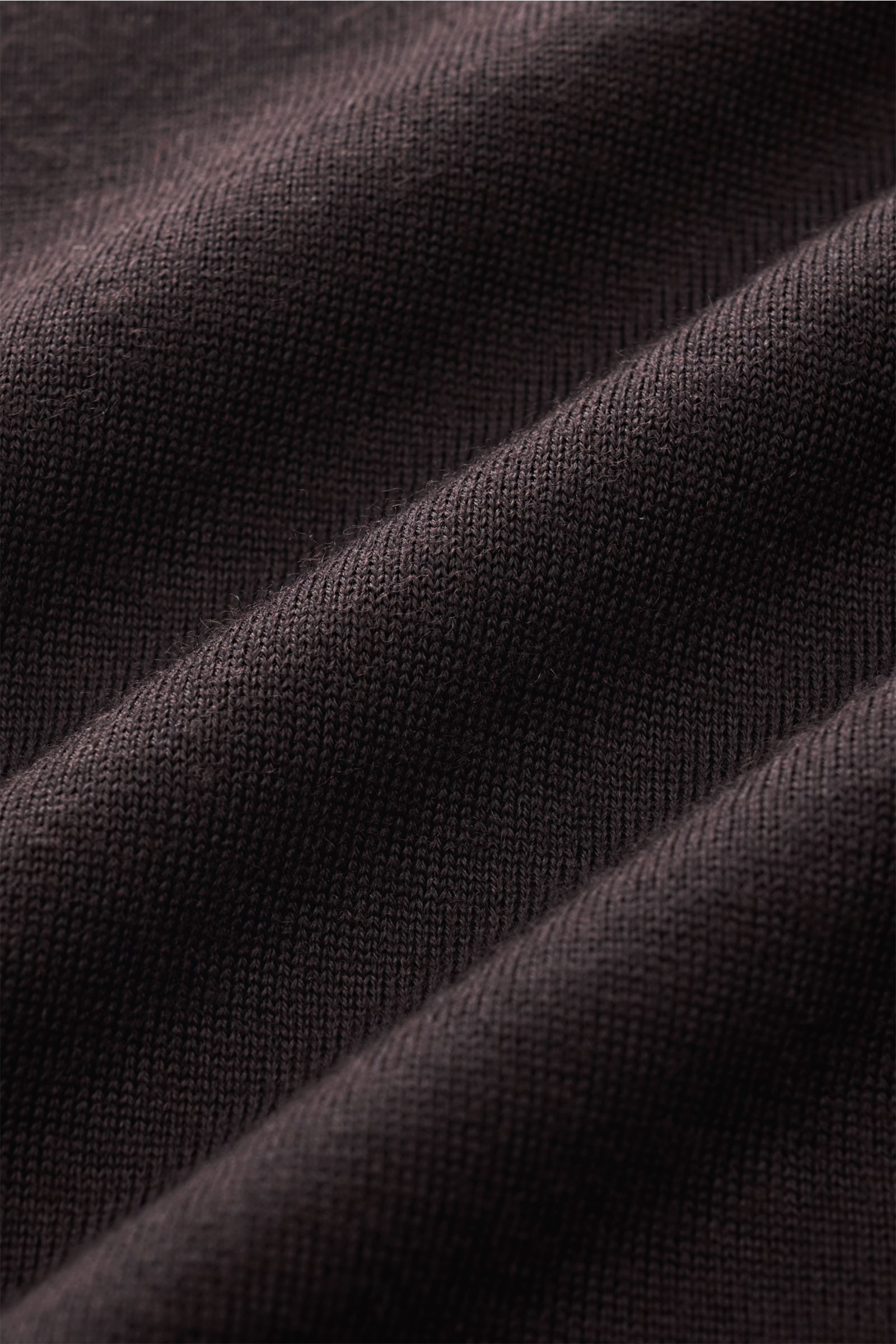 Close-up front view of dark brown von Braun Merino knit polo showing very fine knit texture and soft merino wool fabric.

Description:  
An elegant basic for casual looks: This VON BRAUN knit polo with open collar placket is a casual alternative to a f