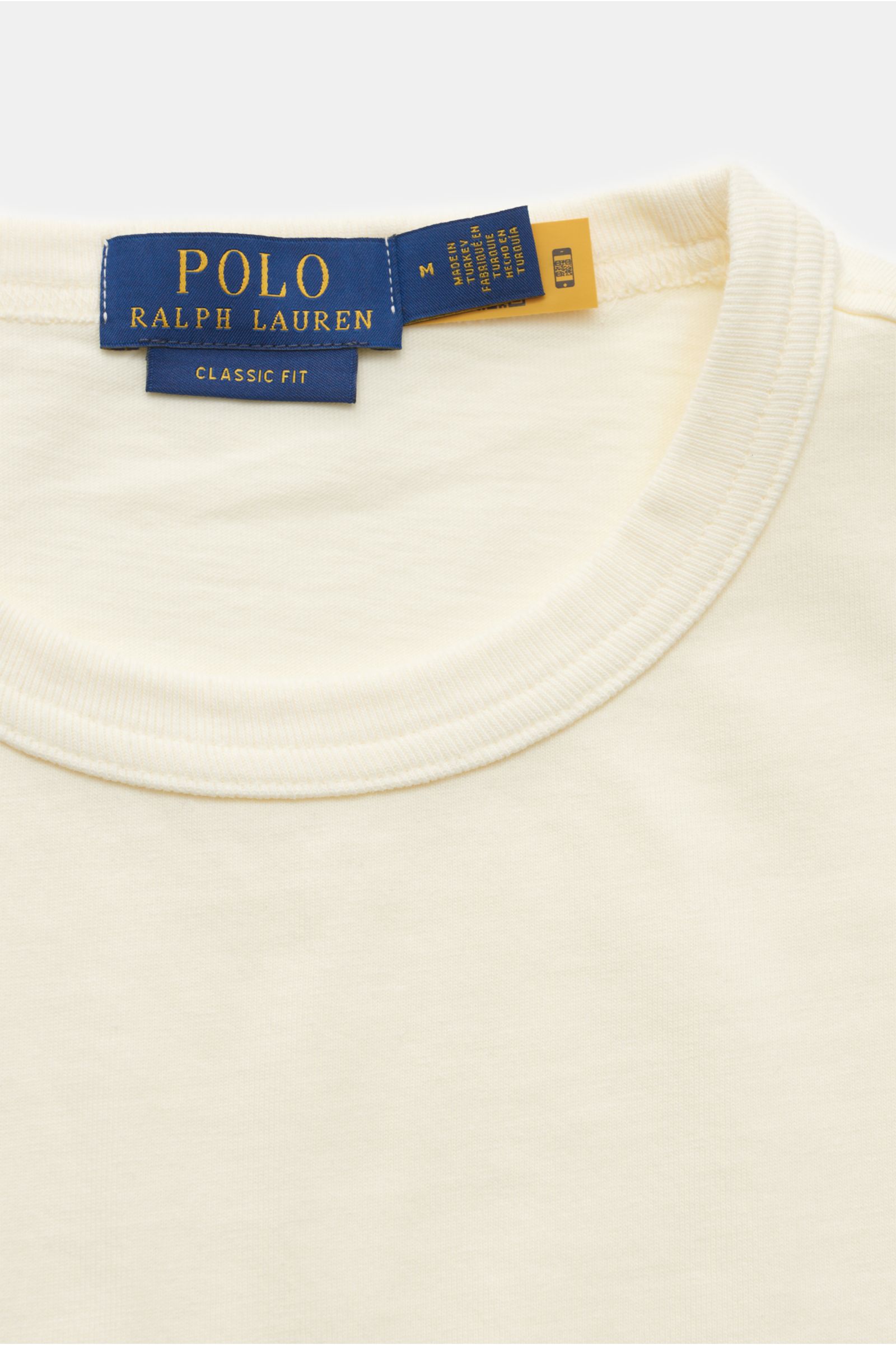 Polo Ralph Lauren Rundhals-T-Shirt pastellgelb, Detailaufnahme von oben, Jersey aus reiner Baumwolle, weiche Qualität, Regular Fit, Rundhalsausschnitt, Logo-Stitching auf der Brust.