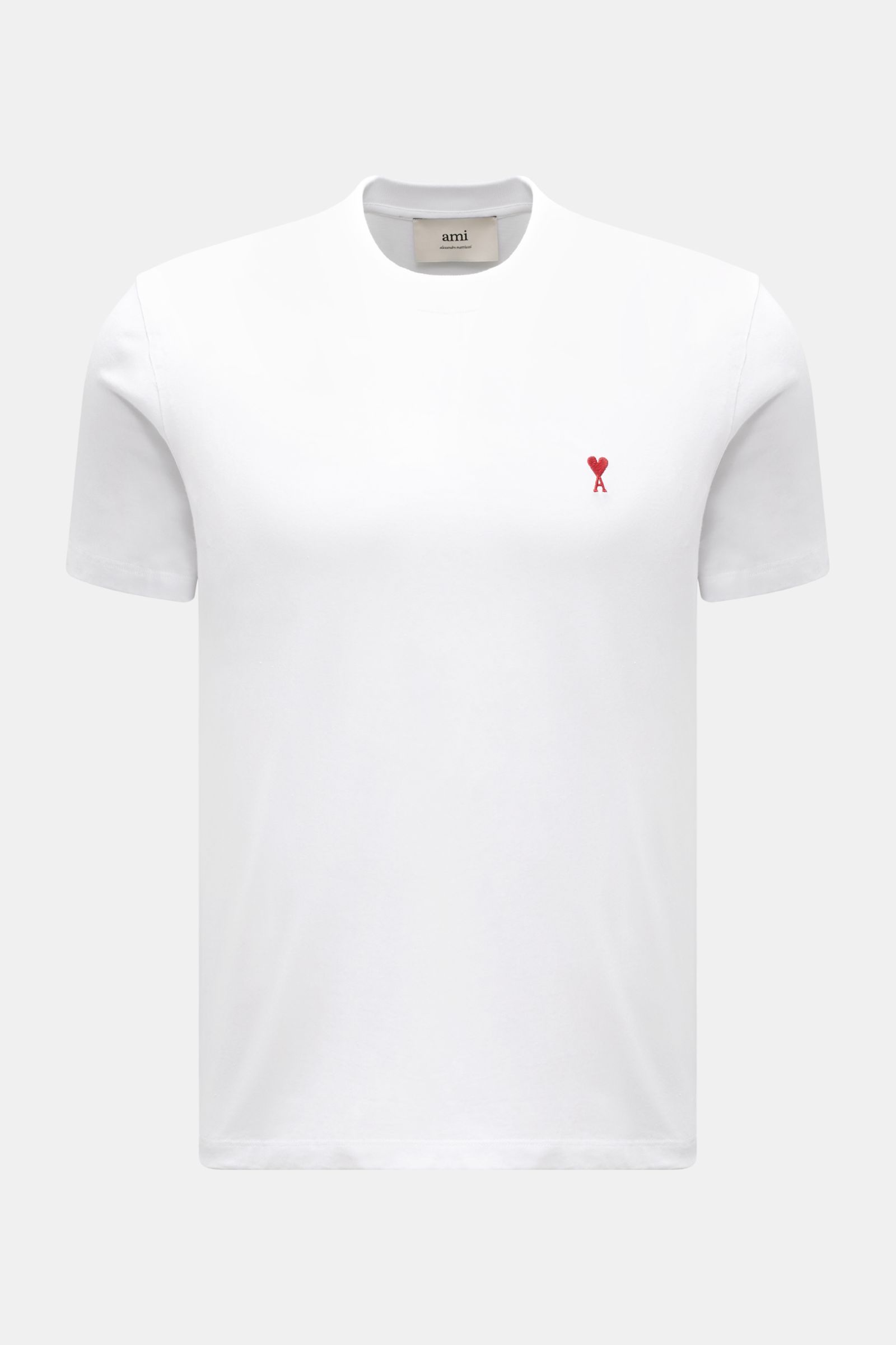 Ami Paris Rundhals-T-Shirt weiß, front view of a classic white cotton jersey slim fit T-shirt with round neckline, soft feel, red heart-stitching on chest, tonal AMI-stitching on back. Klassisches Jersey-Basic vom französischen Label AMI PARIS: Dieses 