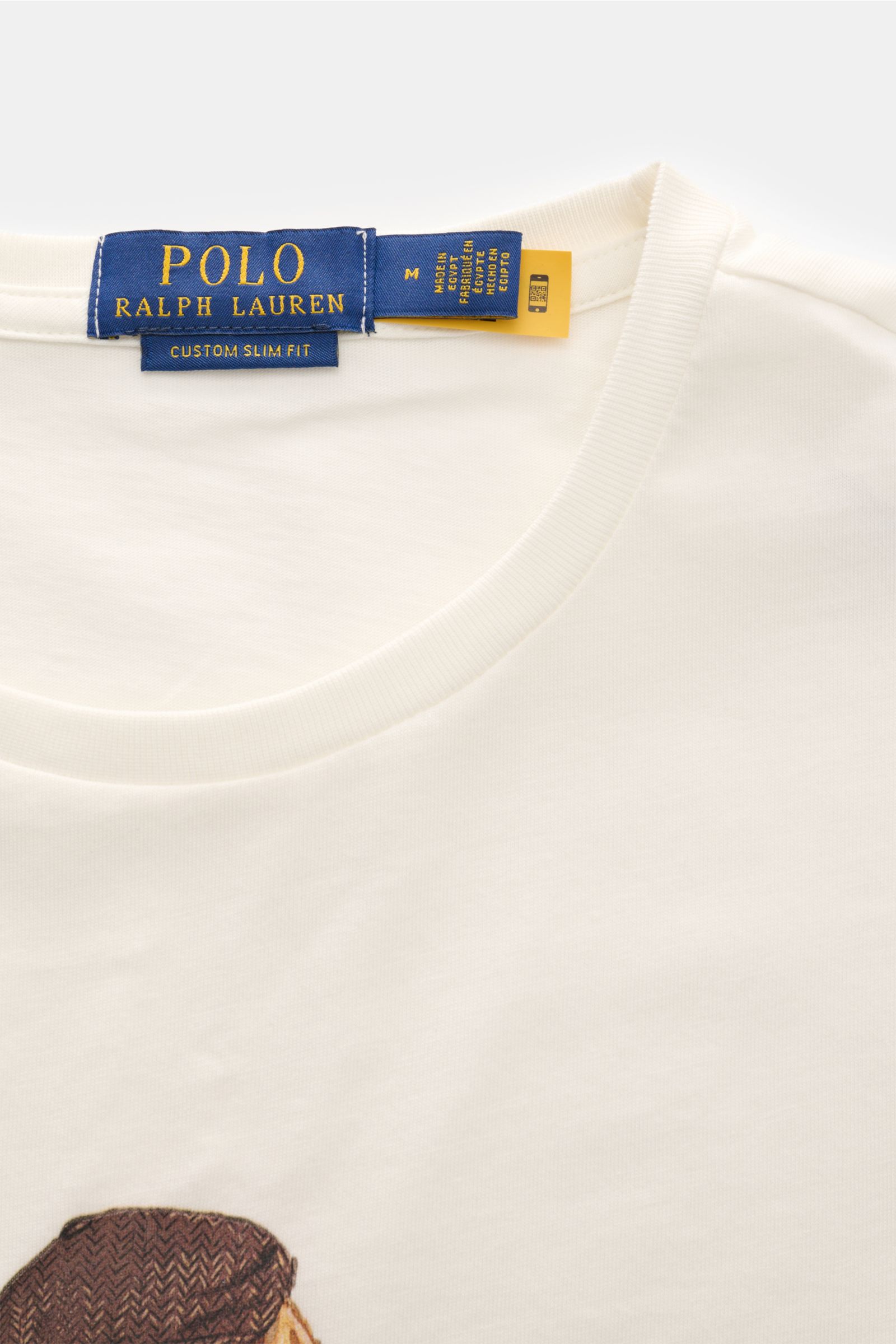 Polo Ralph Lauren Rundhals-T-Shirt offwhite, Detailaufnahme von oben, weicher Baumwoll-Jersey, Extra Slim Fit, Polo-Bear-Print sichtbar.