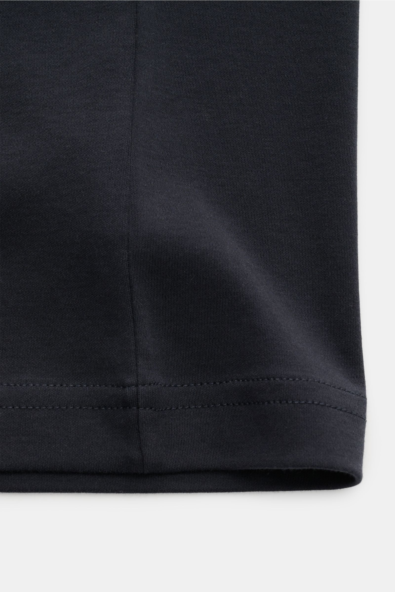 Close-up view of the hem and stitching of the Stefan Brandt Crew neck T-shirt 'Sea Island Eli' dark navy, made from pure Sea Island cotton jersey with a very soft feel, slim fit, and crew neck.