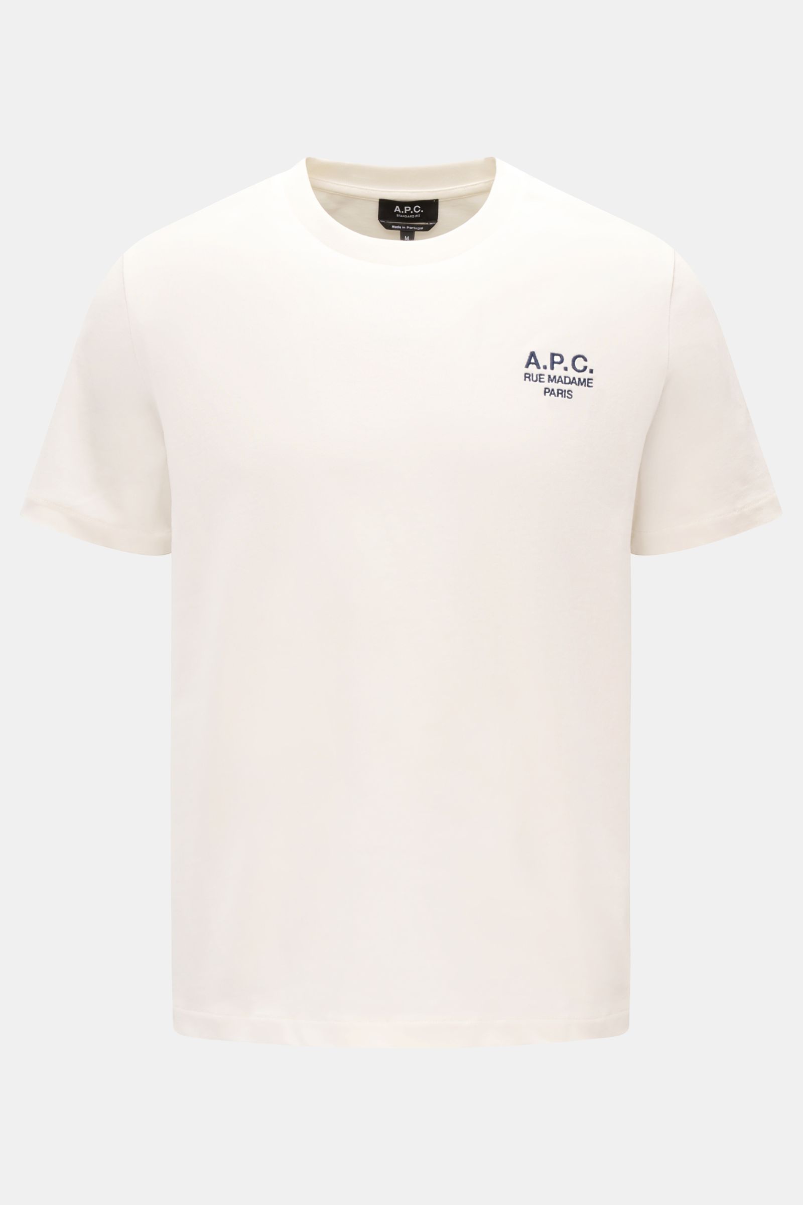 A front-facing view of the A.P.C. Crew neck T-shirt 'Standard Rue Madame' off-white in soft pure cotton jersey with regular fit, crew neck, and A.P.C. logo embroidery on the chest. 

Clean, cool, A.P.C. – the T-shirt 'Standard Rue Madame' is the epitom