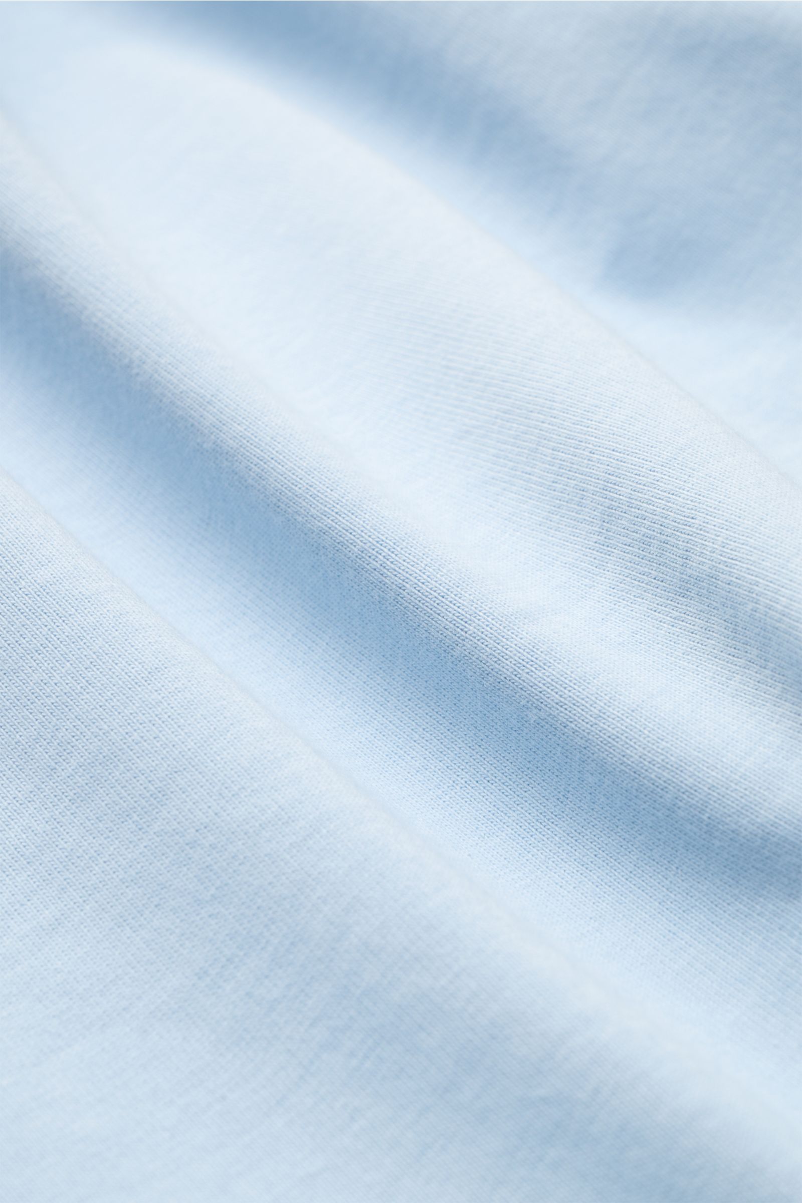 Close-up front view of Thom Browne Crew neck T-shirt smoky blue showing heavy pure cotton jersey fabric with soft feel and jumper-inspired bands.

Description: Monochrome T-shirt by THOM BROWNE in heavy pure cotton jersey fabric refined with jumper-ins