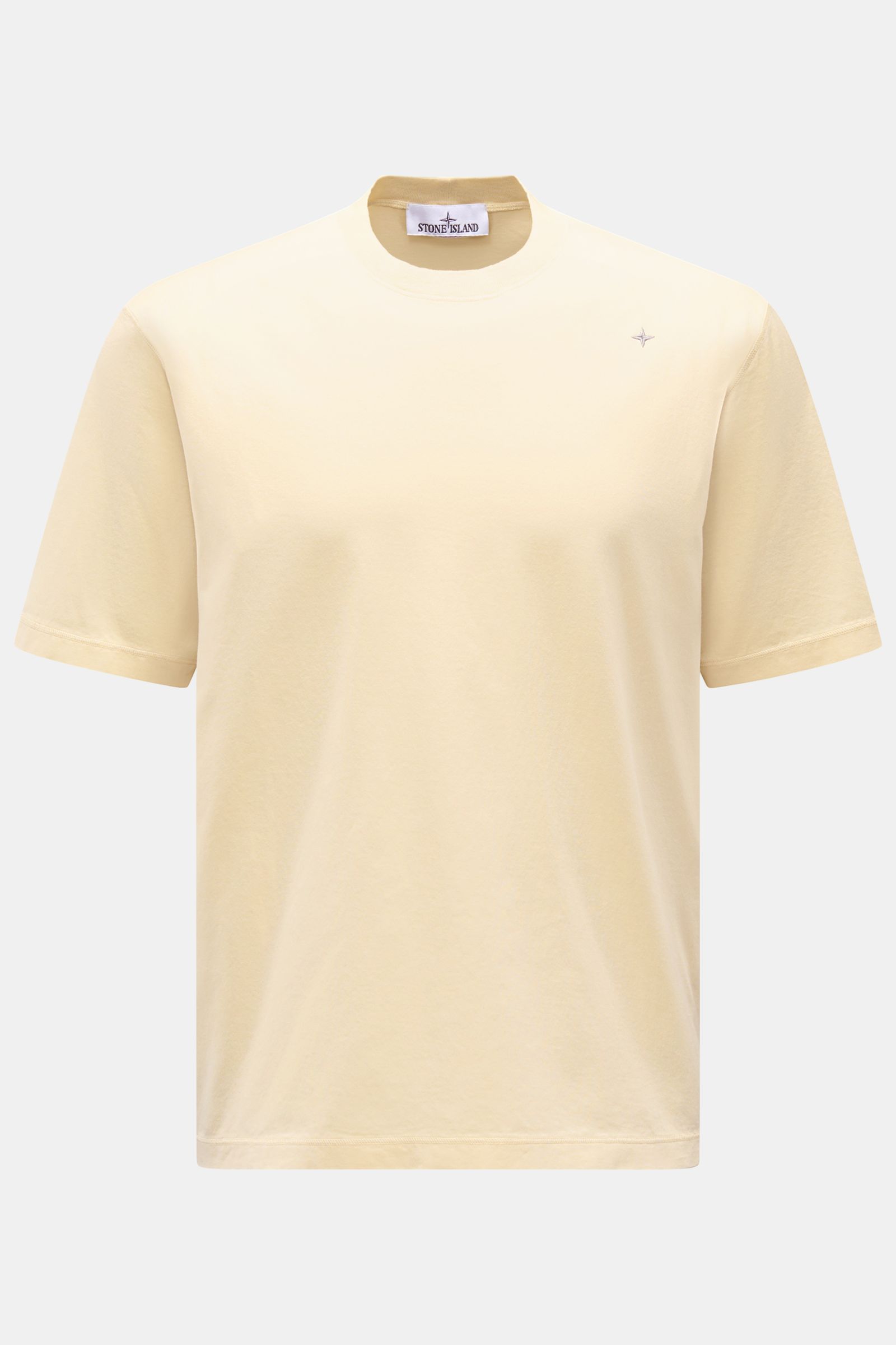 Front view of Stone Island Crew neck T-shirt 'Stellina' pastel yellow, slim fit with subtle contrasting Stellina stitching on chest.

Description: Minimalist expression and precise workmanship: The T-shirt 'Stellina' from the Capsule Collection by STON