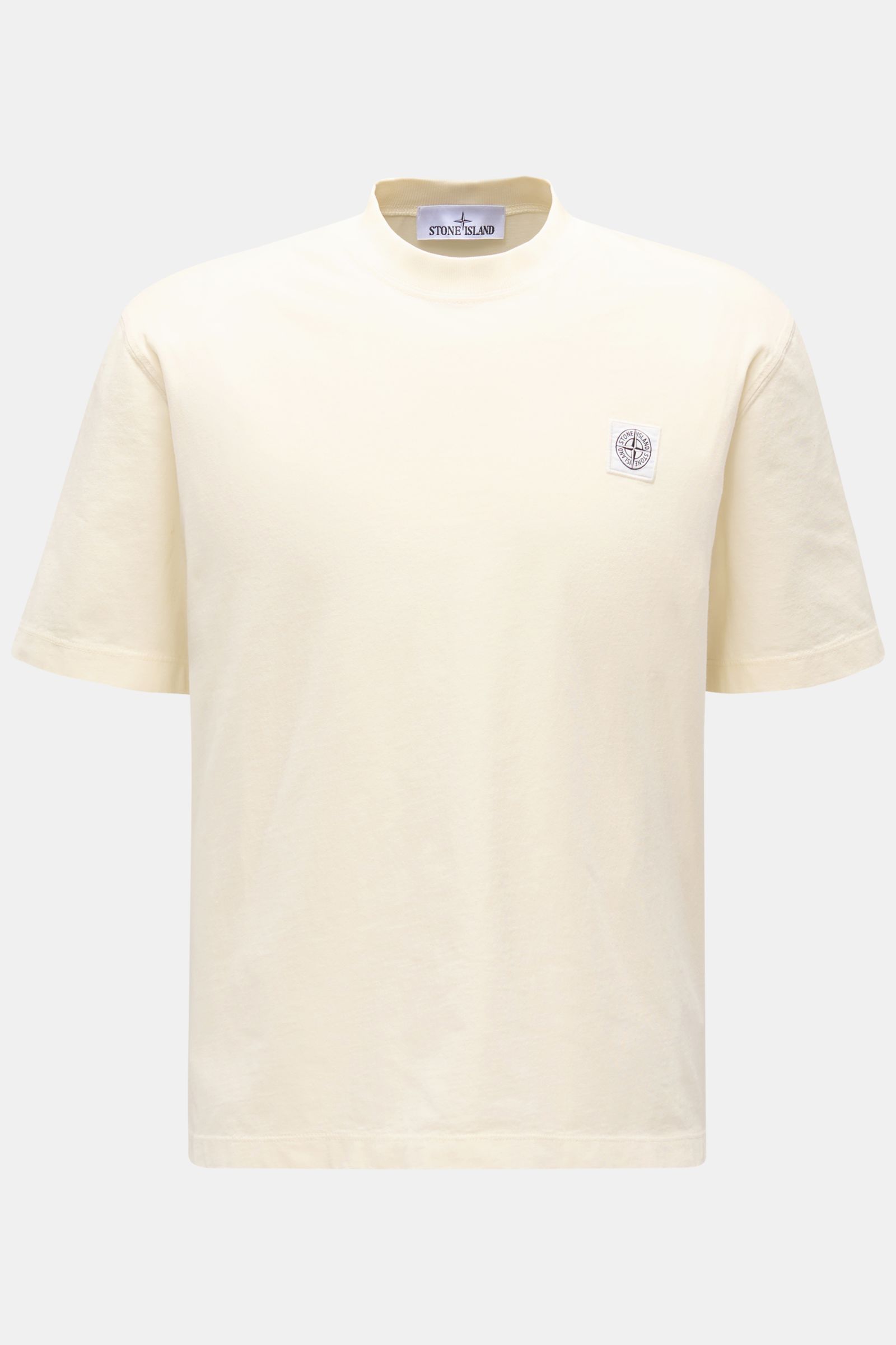Stone Island T-Shirt 'Dyed Regular Fit' creme in Frontansicht, aus reiner Baumwolle mit weichem Griff, Rundhalsausschnitt und Weblabel auf der Brust.