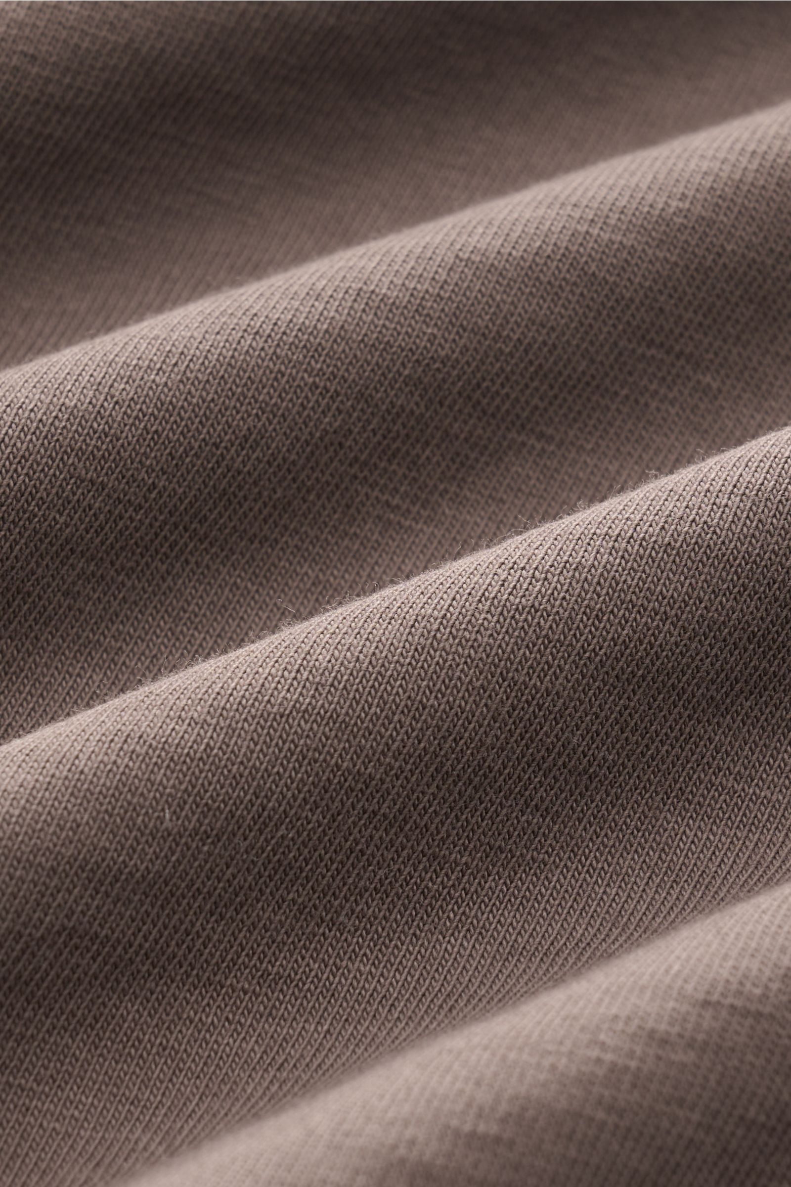 Close-up fabric detail of the B.F. Knitwear Crew neck T-shirt grey-brown showing soft pure cotton texture in a precise fit from a top-down perspective. A high-quality basic for the spring and summer season: This T-shirt by B.F. KNITWEAR is made of pure
