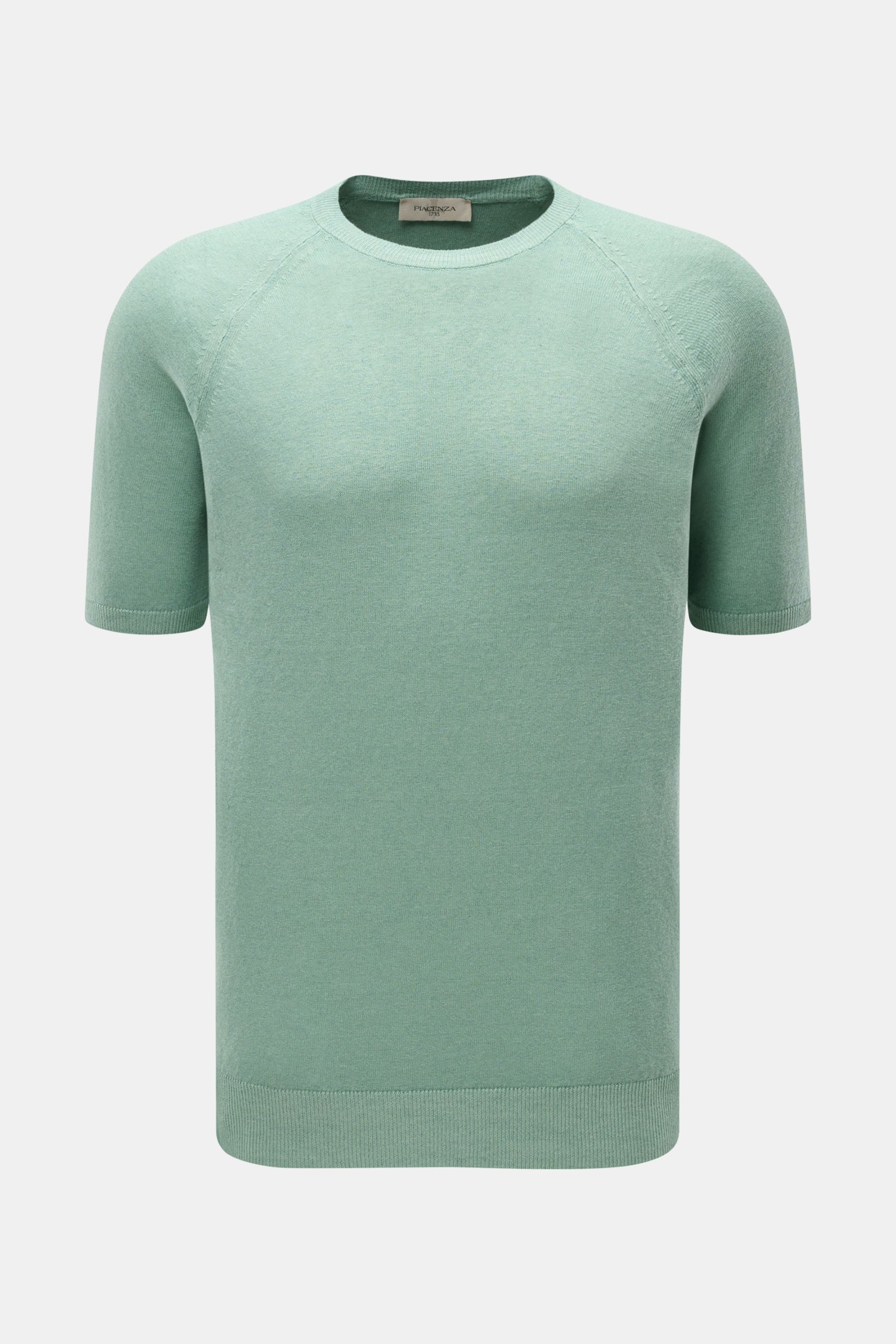 Front view of Piacenza 1733 Short sleeve jumper light green, fine knit linen and cotton blend with crew neck and raglan sleeves.

Tradition, innovation and uncompromising quality: For centuries, PIACENZA 1733 has been synonymous with Italian craftsmans