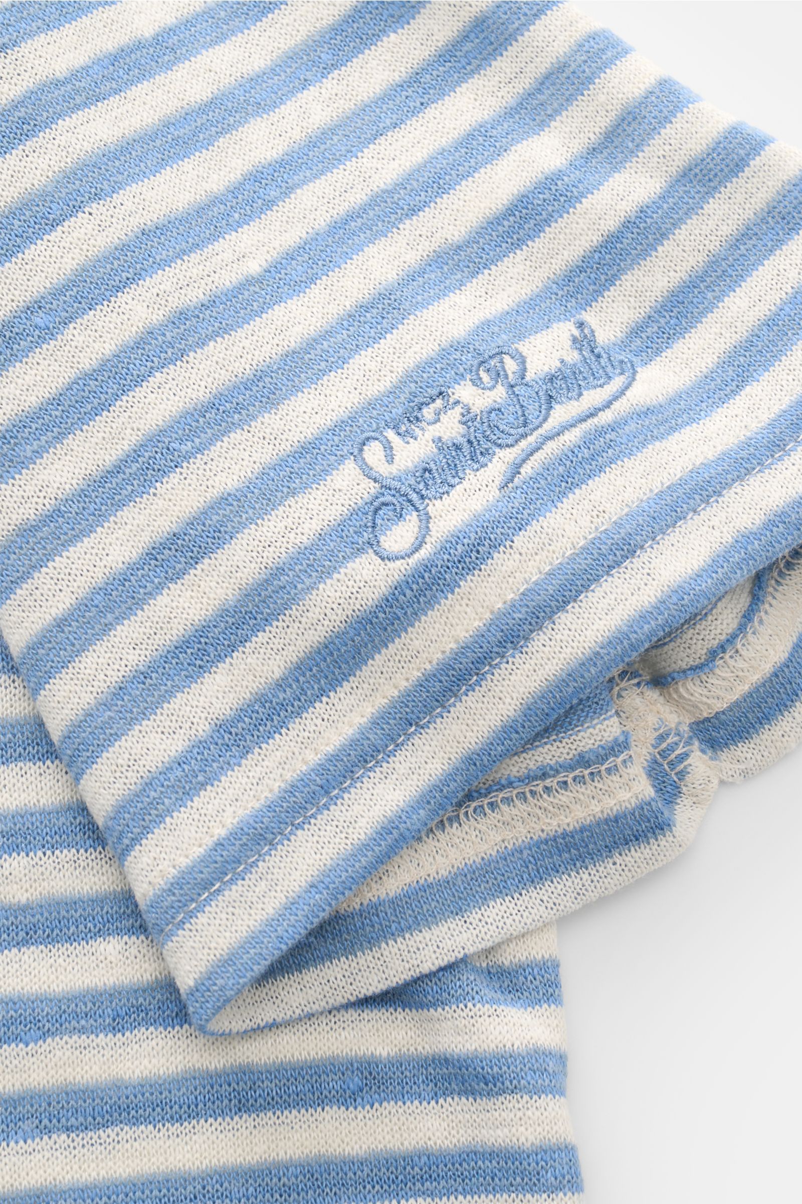 Close-up, top-down view of the MC2 Saint Barth Crew neck T-shirt 'Dover Stripes' cream/blue striped sleeve, showing classic nautical stripes and St. Barth embroidery.

For your casual summer looks: The 'Dover Stripes' T-shirt by MC2 SAINT BARTH, made f