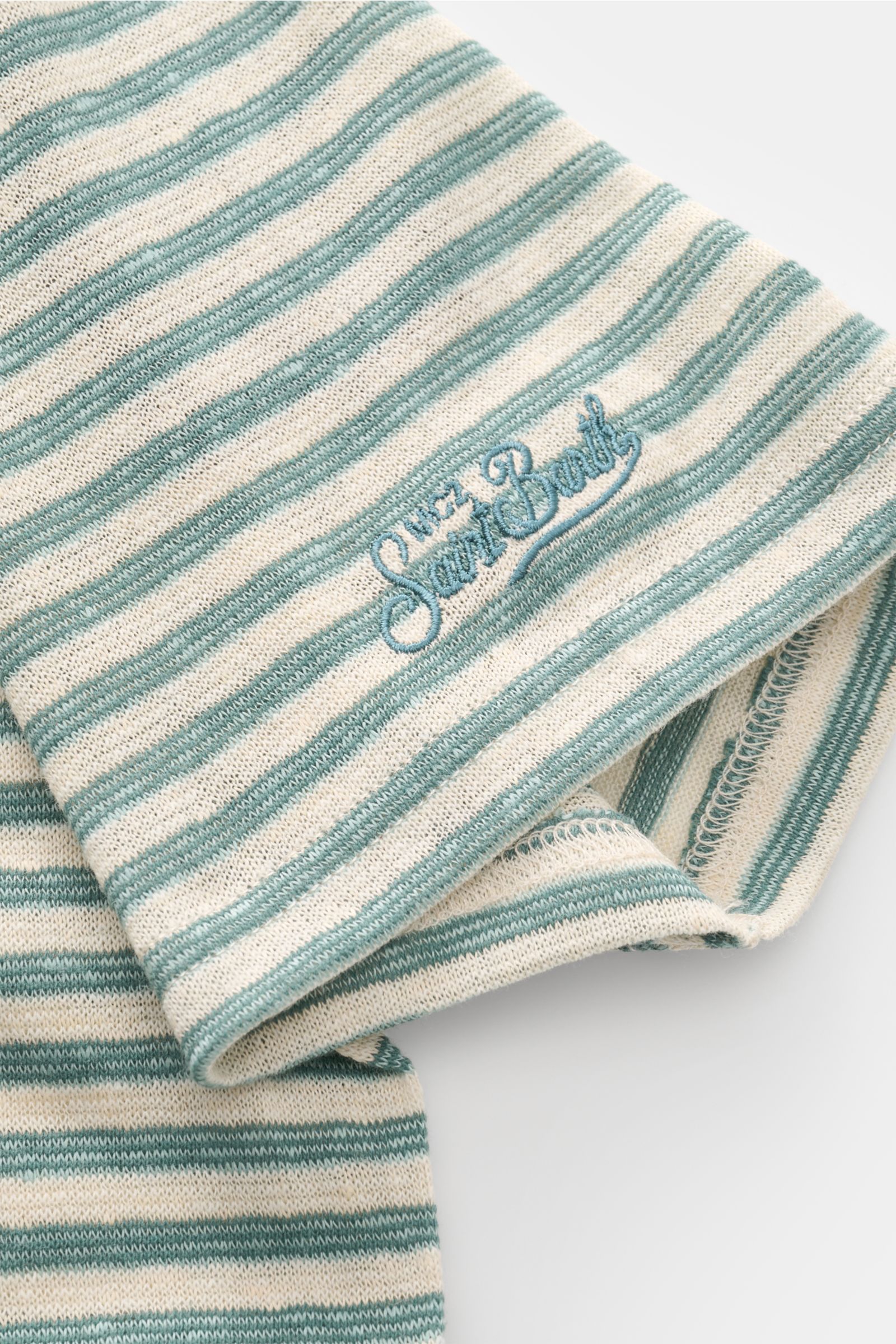 MC2 Saint Barth Crew neck T-shirt 'Dover Stripes' cream/turquoise striped, close-up side view of soft linen blend fabric with embroidered sleeve logo, casual summer look. For your casual summer looks: The 'Dover Stripes' T-shirt by MC2 SAINT BARTH, mad