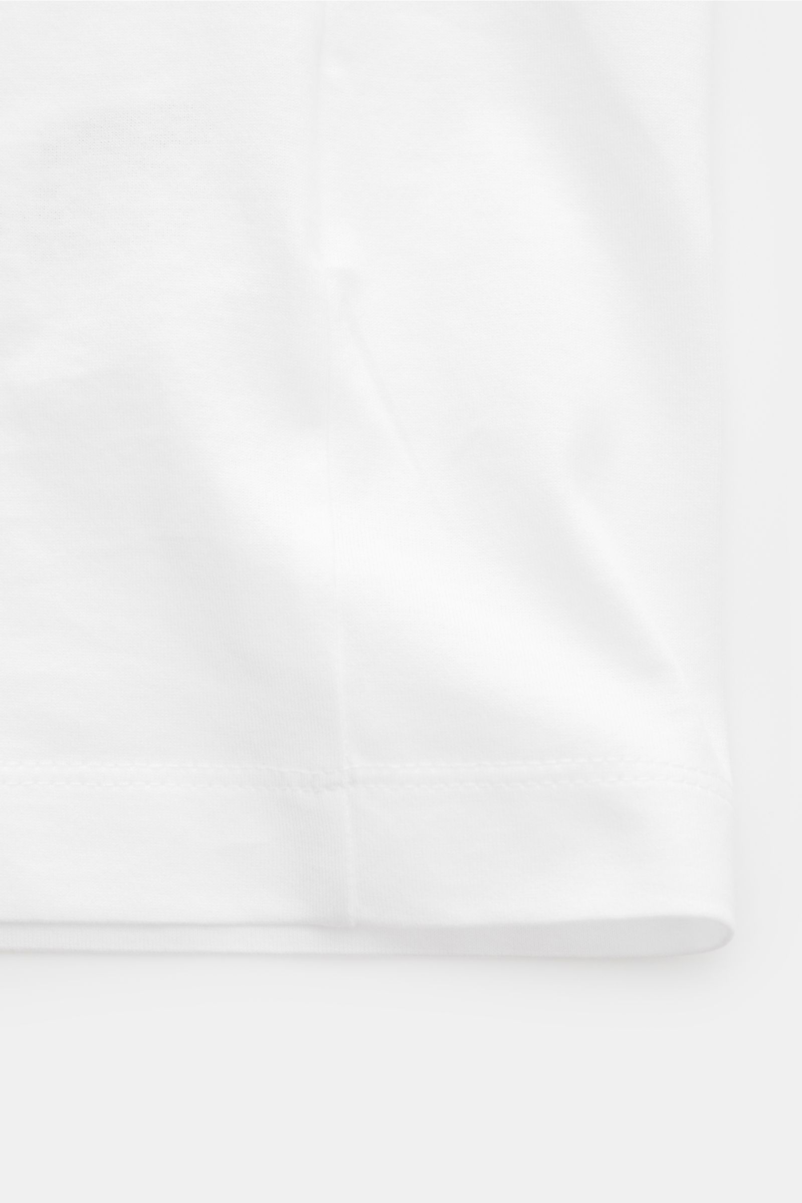 Dondup Rundhals-T-Shirt weiß aus reiner Baumwolle, Slim Fit, weicher Griff, Rundhalsausschnitt, DONDUP-Logo, Detailaufnahme Saum frontal.