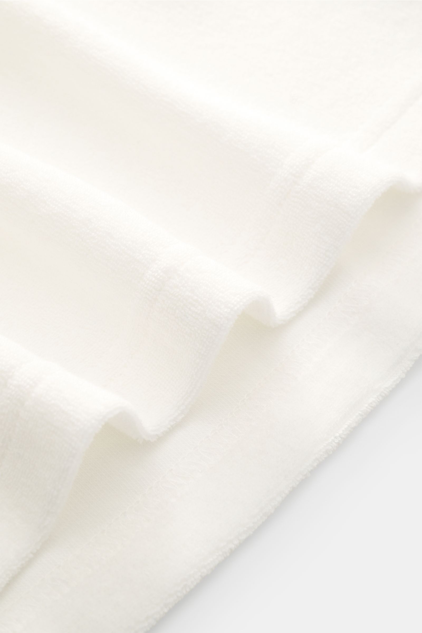 Zeybra Portofino 1962 Frottee Rundhals-T-Shirt 'Spugna' offwhite, Detailaufnahme der weichen Frotteestruktur aus Microfaser und Baumwolle.
